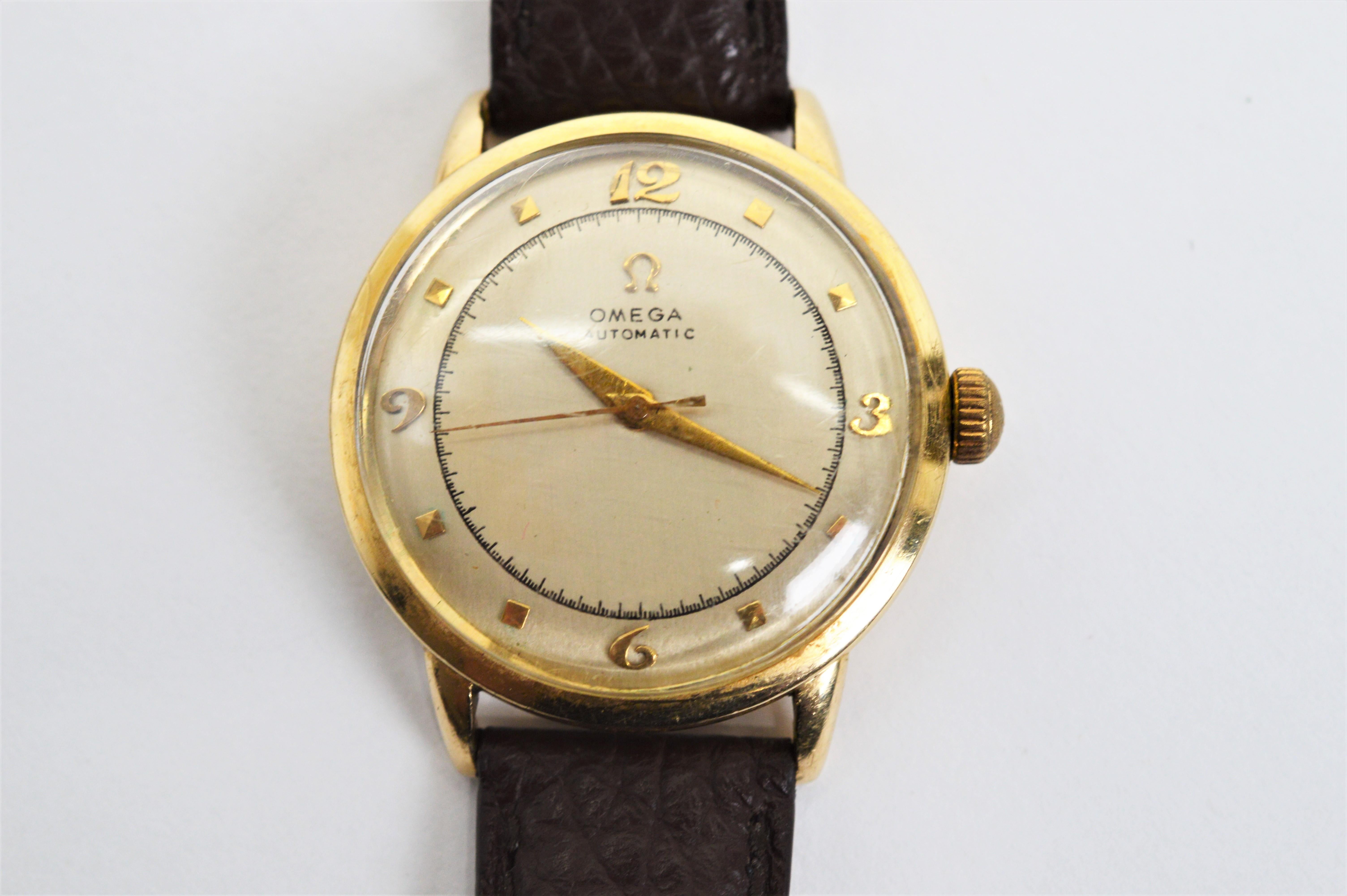 In the popular 32mm case of the period, this great 1950s Omega timepiece is a winner.  In original condition, the domed crystal and authentic retro dial with rounded numerals and second sweep dial are its signature. Sometimes called a bumper watch