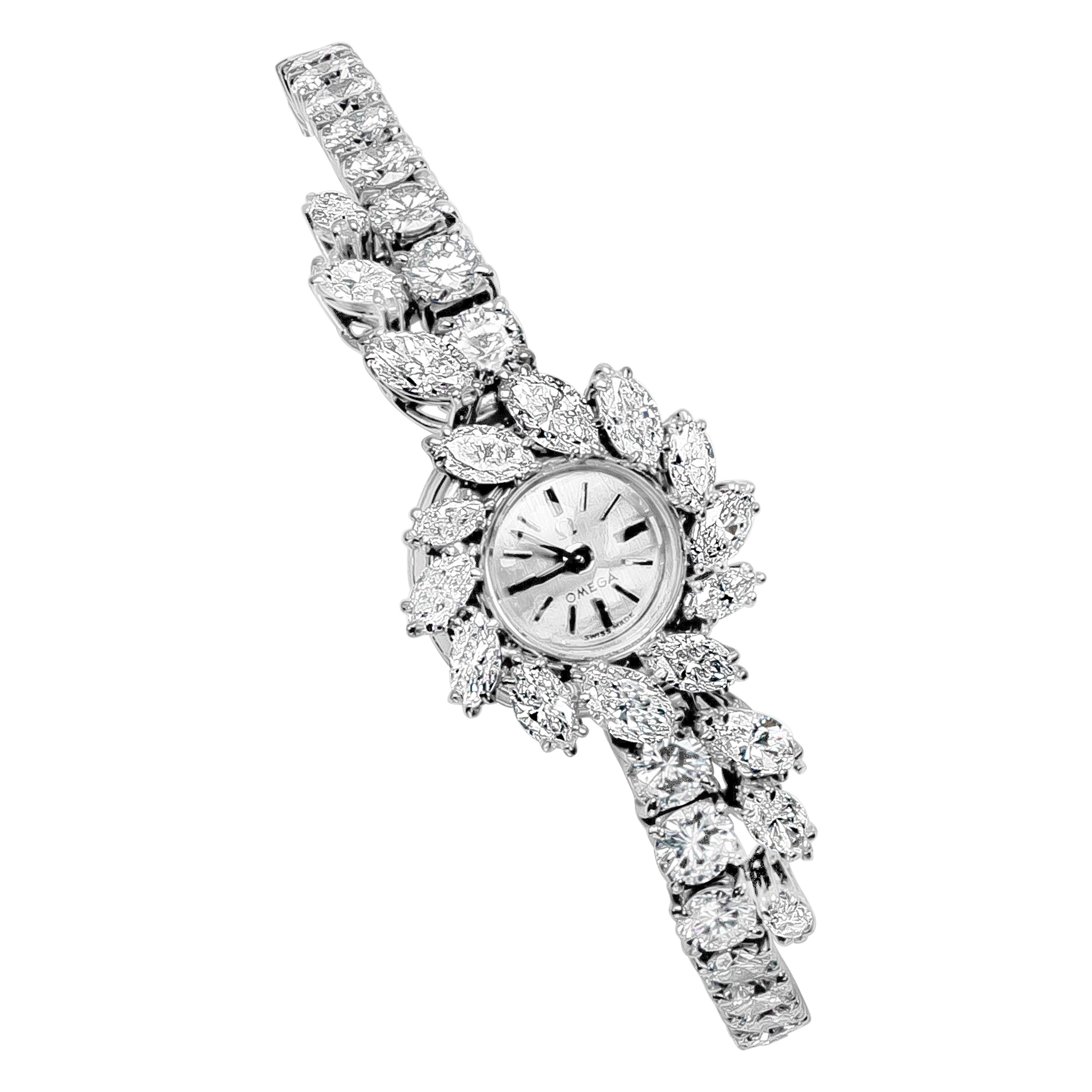 Elegantly made 9 carat total mixed marquise and brilliant round diamond vintage ladies wrist watch. 6.25 inches in length, made in platinum. Signed and made by Omega.