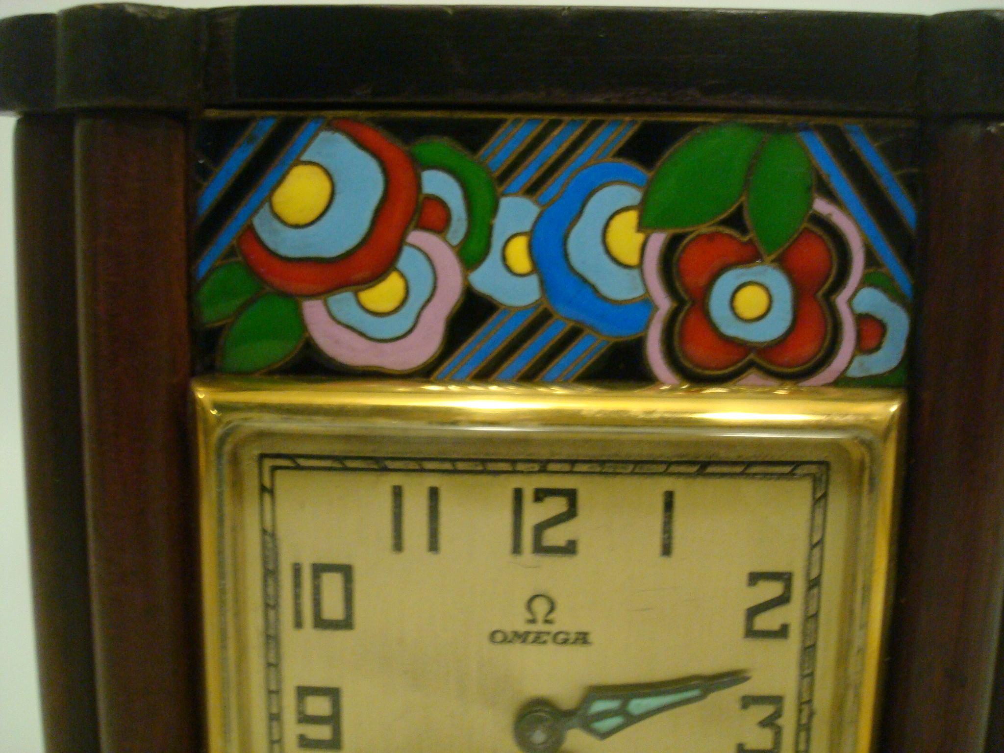 Swiss Omega, a Wood and Enamel Art Deco Eight Day Desk Clock For Sale