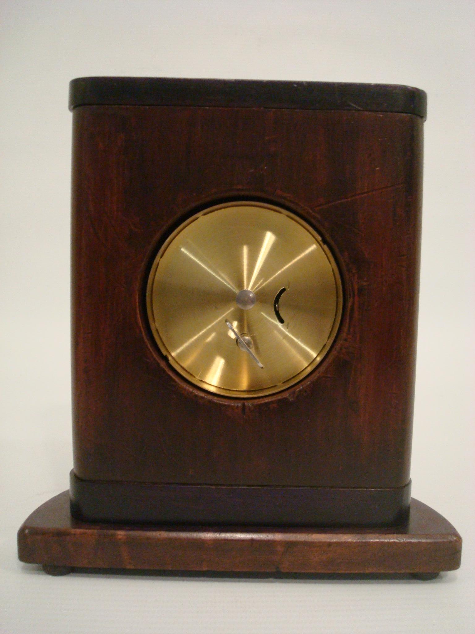Brass Omega, a Wood and Enamel Art Deco Eight Day Desk Clock For Sale
