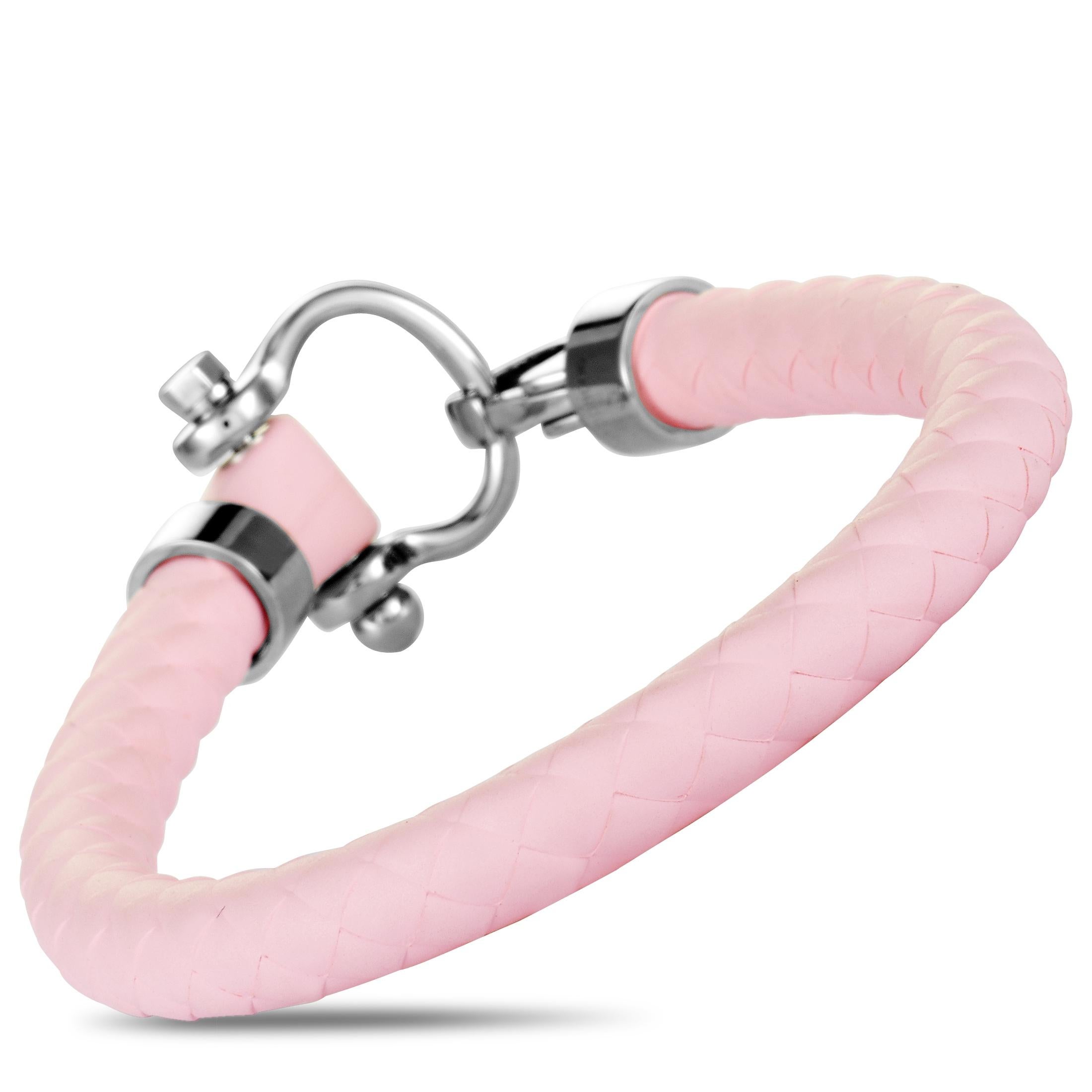The Omega “Aqua Sailing” bracelet is made out of stainless steel and pink rubber and weighs 26.8 grams. It measures 8.00” in length and features lobster claw closure.
 
 This bracelet is offered in brand new condition and includes a gift box.