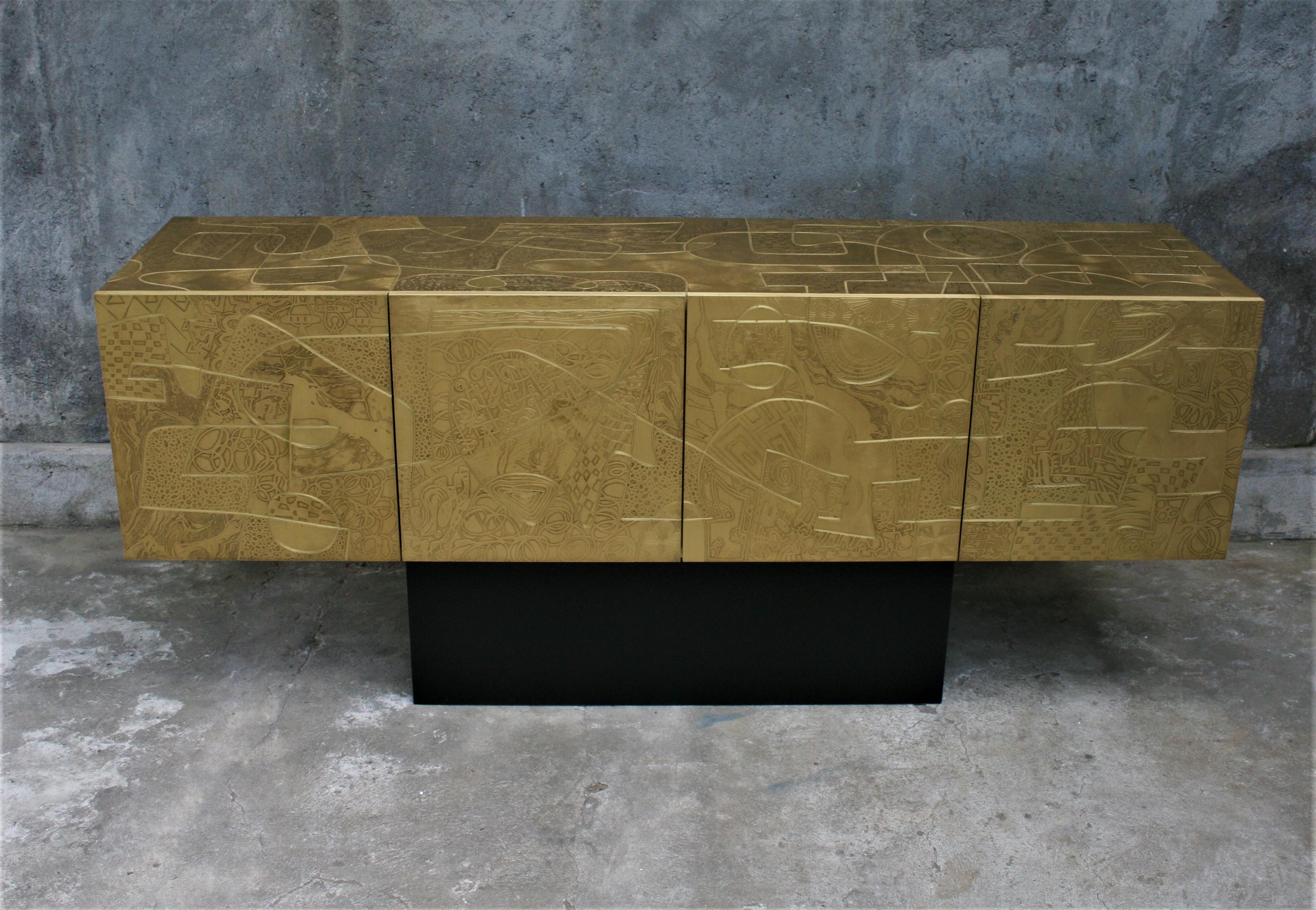 Four-door cabinet by Belgian artist Felix de Boussy for studio Belgali. Acid etched door panels and body, black lacquered base. Unique piece of art.






 