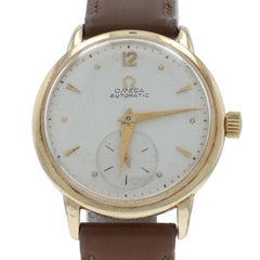 Montre homme Omega Bumper Vintage 1950 - or jaune 14k automatique