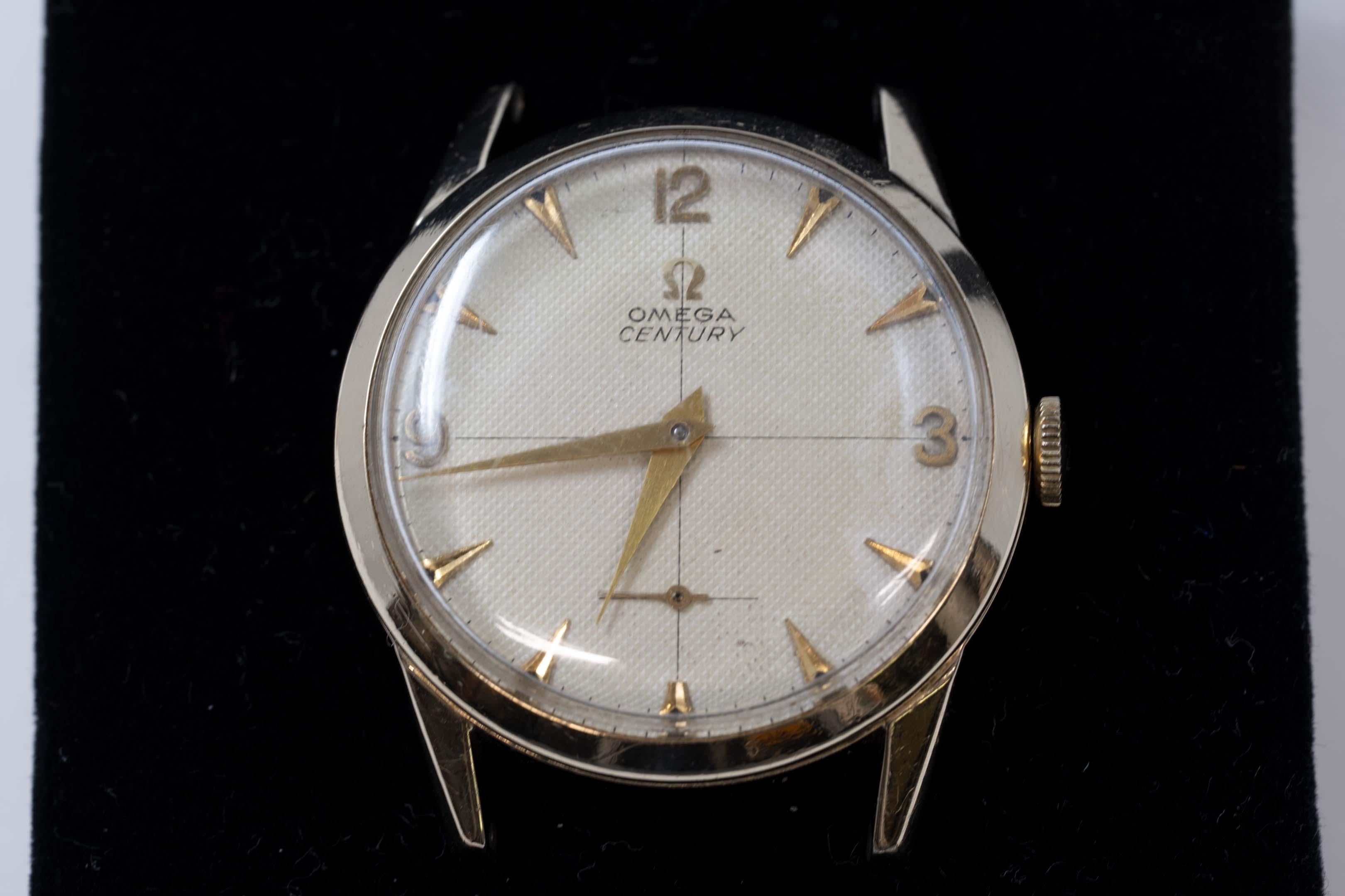 Omega century 10k gold-filled manual winding watch caliber 266, circa 1950. No band, 17 jewel case gold & steel, lug 18mm, case #3099347, movement serial number 14566450. In good working order, good condition. Made in Switzerland, beige coloured