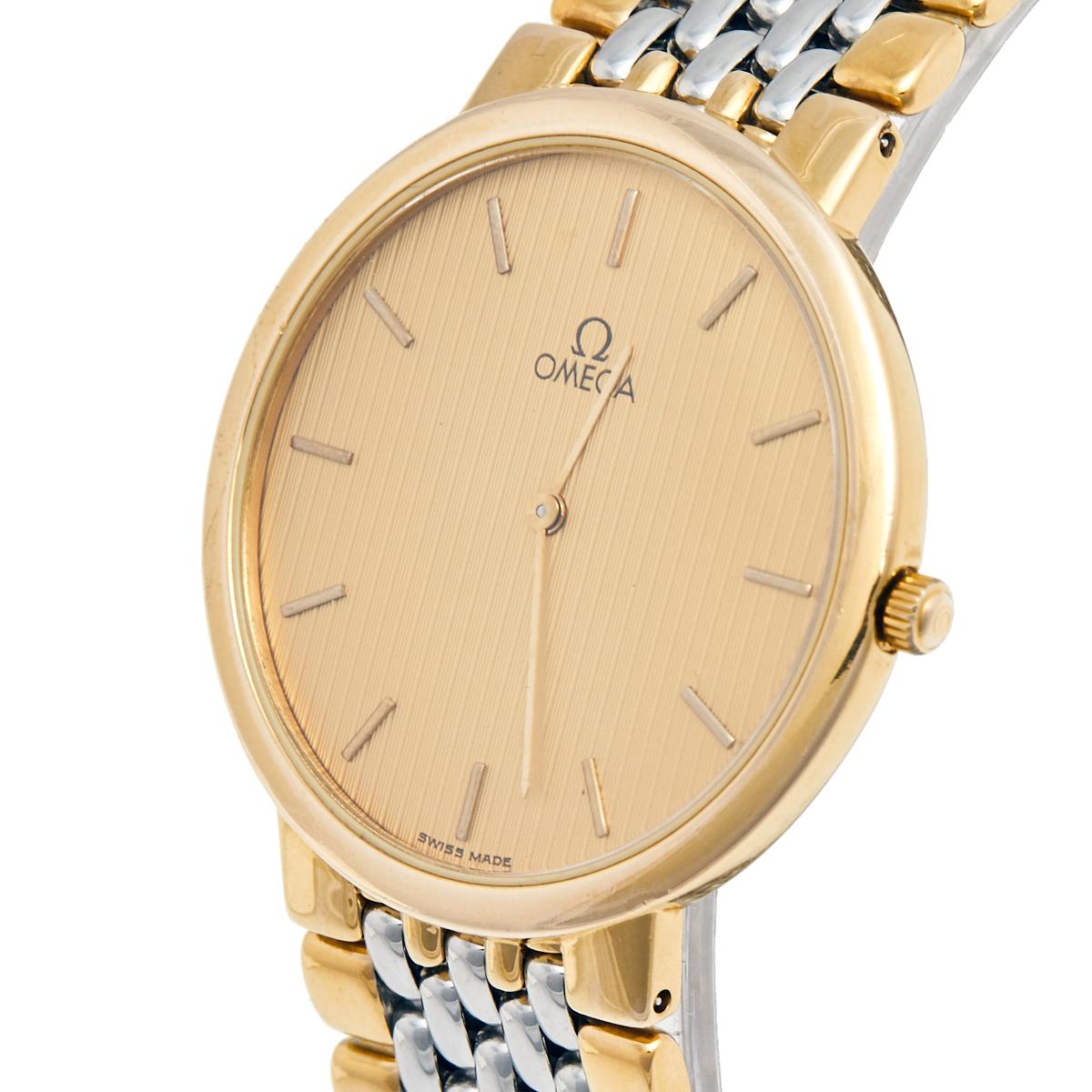A creation to pair with formals or casuals alike is this Omega De Ville beauty. Made from two-tone stainless steel, the watch is smooth and efficient. The case is slim and it holds a champagne dial fixed with stick hour markers, two hands, and the