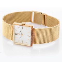 Omega Montre-bracelet classique à remontage manuel en or jaune