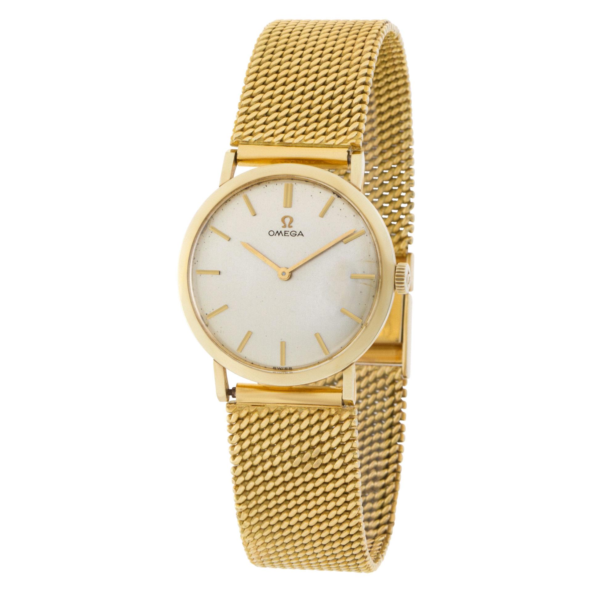 Vintage Omega Classic in 14k on an mesh band in 18k yellow gold. Manual wind with 28.5 mm case size. Ref D6649. Mesh bracelet fit for a 7.5'' wrist. Circa 1970s.
 Fine Pre-owned Omega Watch.   Certified preowned Classic Omega Classic D6649 watch is
