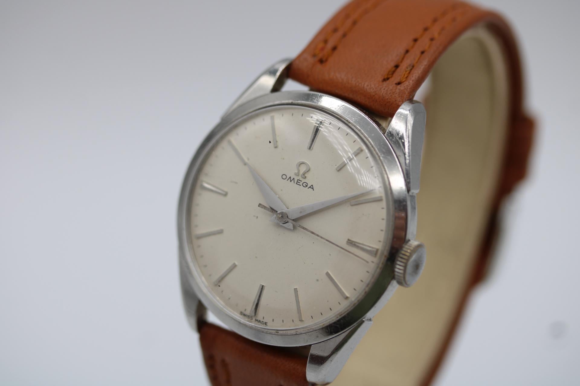 Omega Classic Vintage 2910-5  Jumbo Case  Circa 1950

A rare find from the golden age of Omega—this Vintage Omega 2910-5 is a timeless classic from the 1950s. With its larger 35mm Jumbo case, this piece offers a bold vintage presence that was well