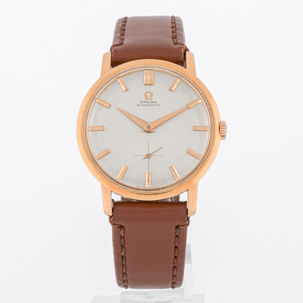 Omega Classic vintage con caja de oro rosa y pulsera de cuero, una pieza de coleccionista de los años 60.