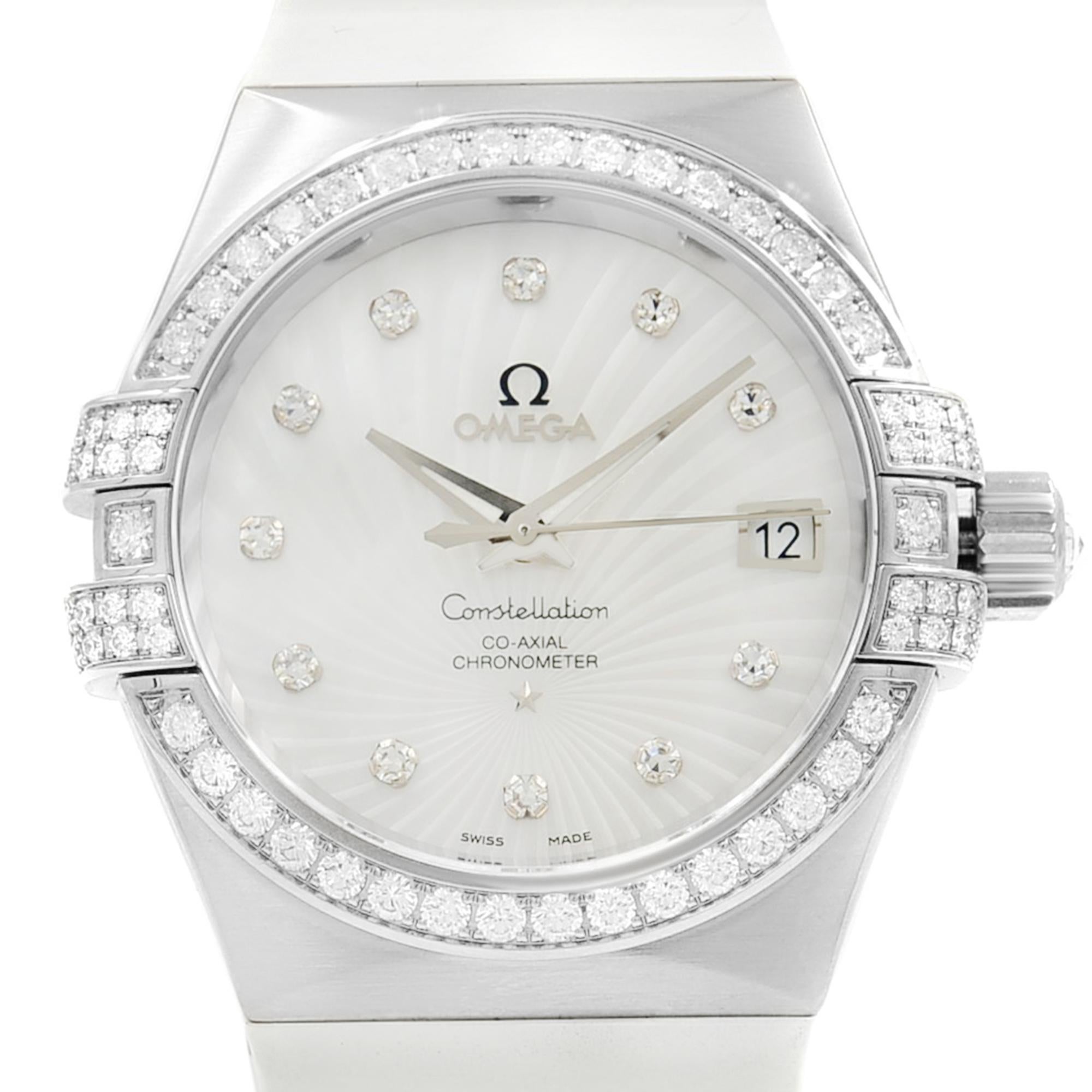 Unworn Omega Constellation 18k White Gold MOP Dial Diamond Watch. This Beautiful Timepiece Features: 18k White Gold Case, A White Mother-of-Pearl Dial Decorated with A Supernova Pattern, Diamond-Set Indexes on Bezel, Claws, and Dial. Comes With