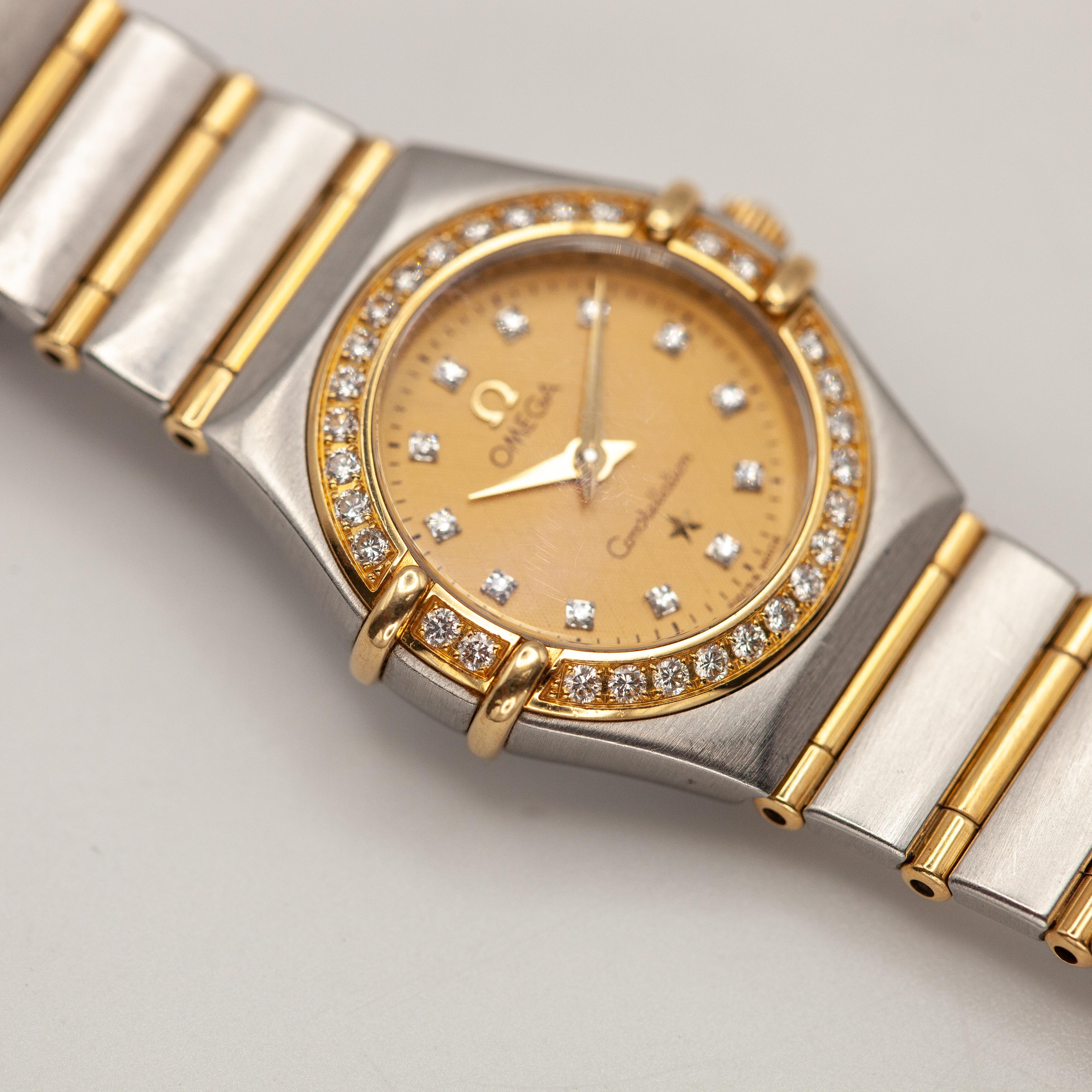 Moderne Montre pour dames Omega Constellation en or jaune 18K et acier inoxydable avec diamants en vente