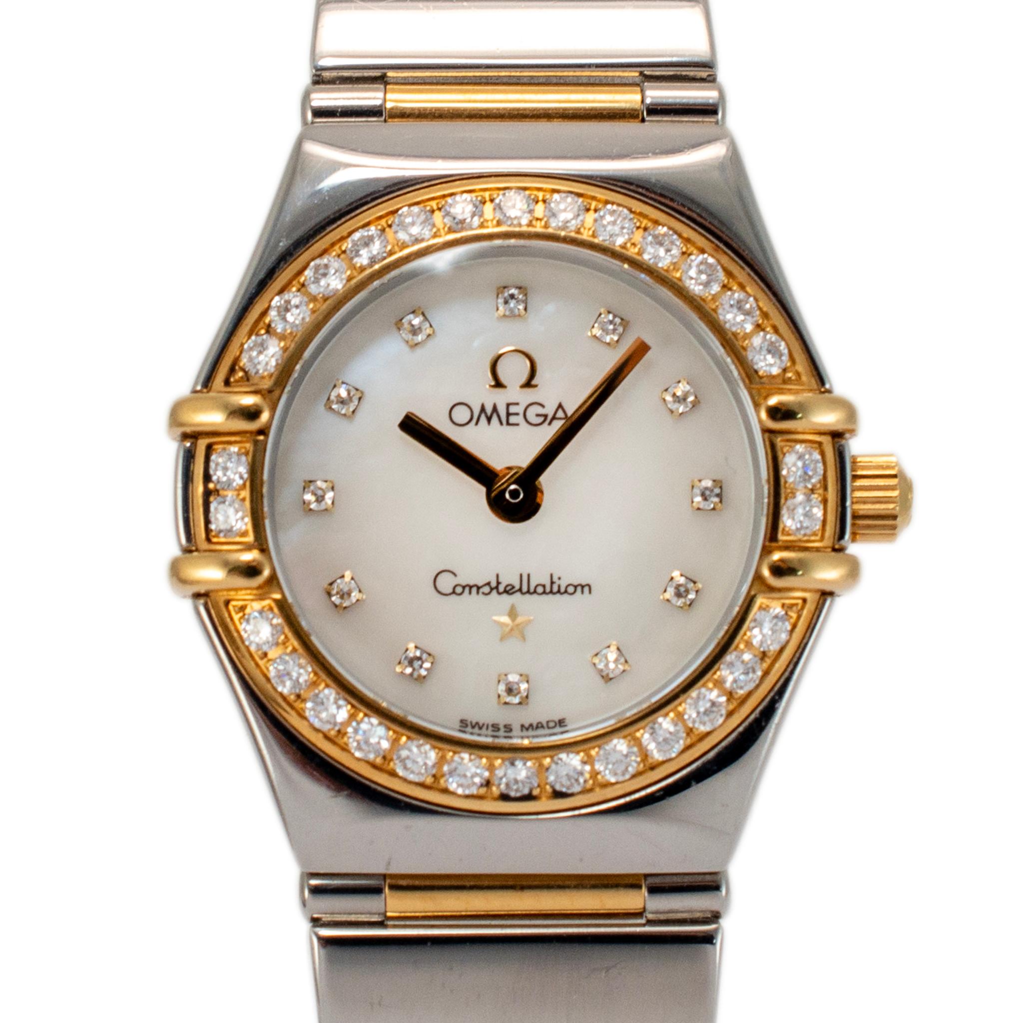 Brand: Omega 

Gender: Ladies

Metal Type: Stainless Steel & 18K Yellow Gold

Diameter: 22.50 mm

Weight: 47.82 grams

One ladies stainless steel and 18K yellow gold diamond OMEGA Swiss-made watch. The metals were tested and determined to be