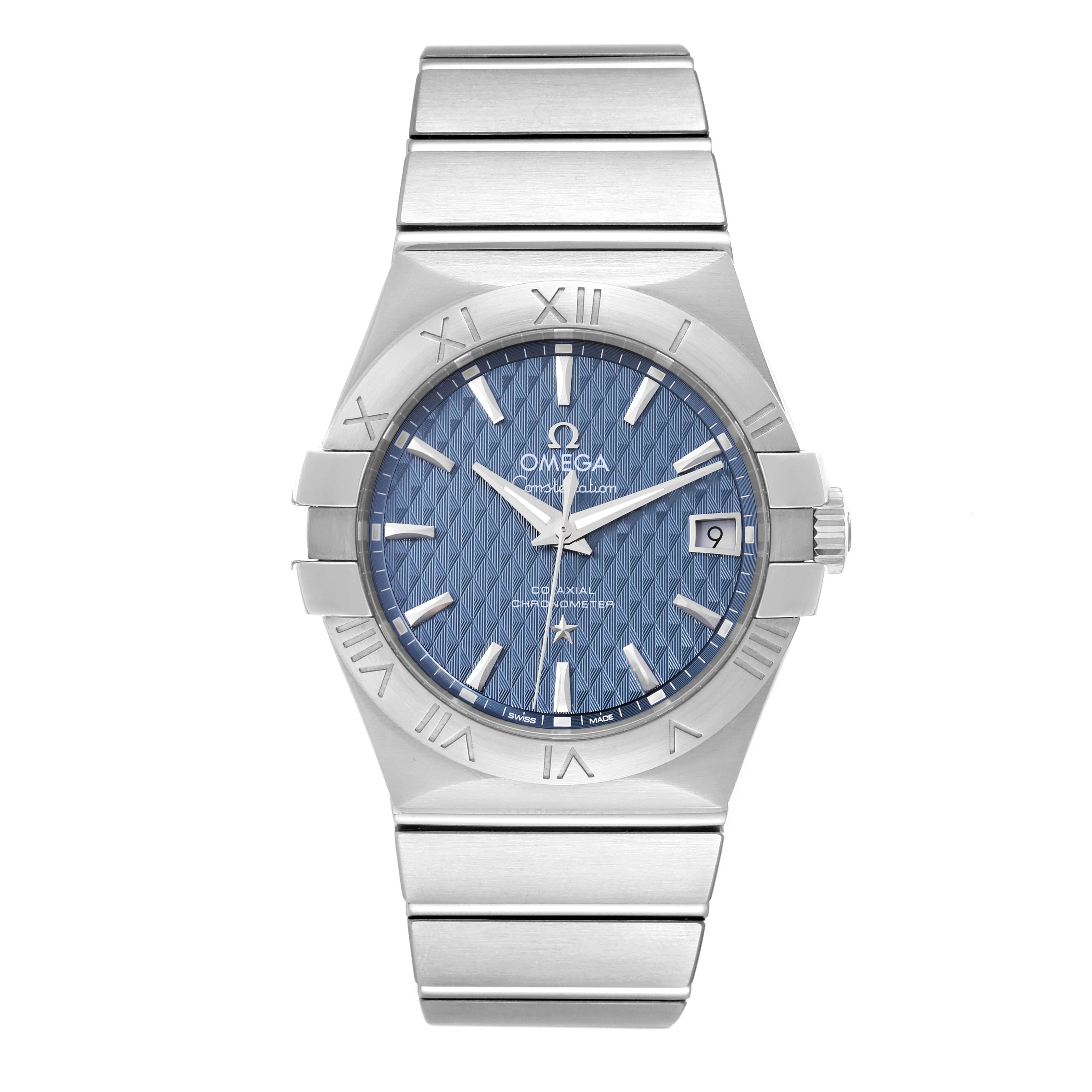 Omega Constellation 35mm Blue Dial Steel Mens Watch 123.10.35.20.03.002 Box Card. Automatic self-winding chronometer, Co-Axial Escapement movement. Stainless steel case 35.0 mm in diameter. Omega logo on a crown. Exhibition transparent sapphire