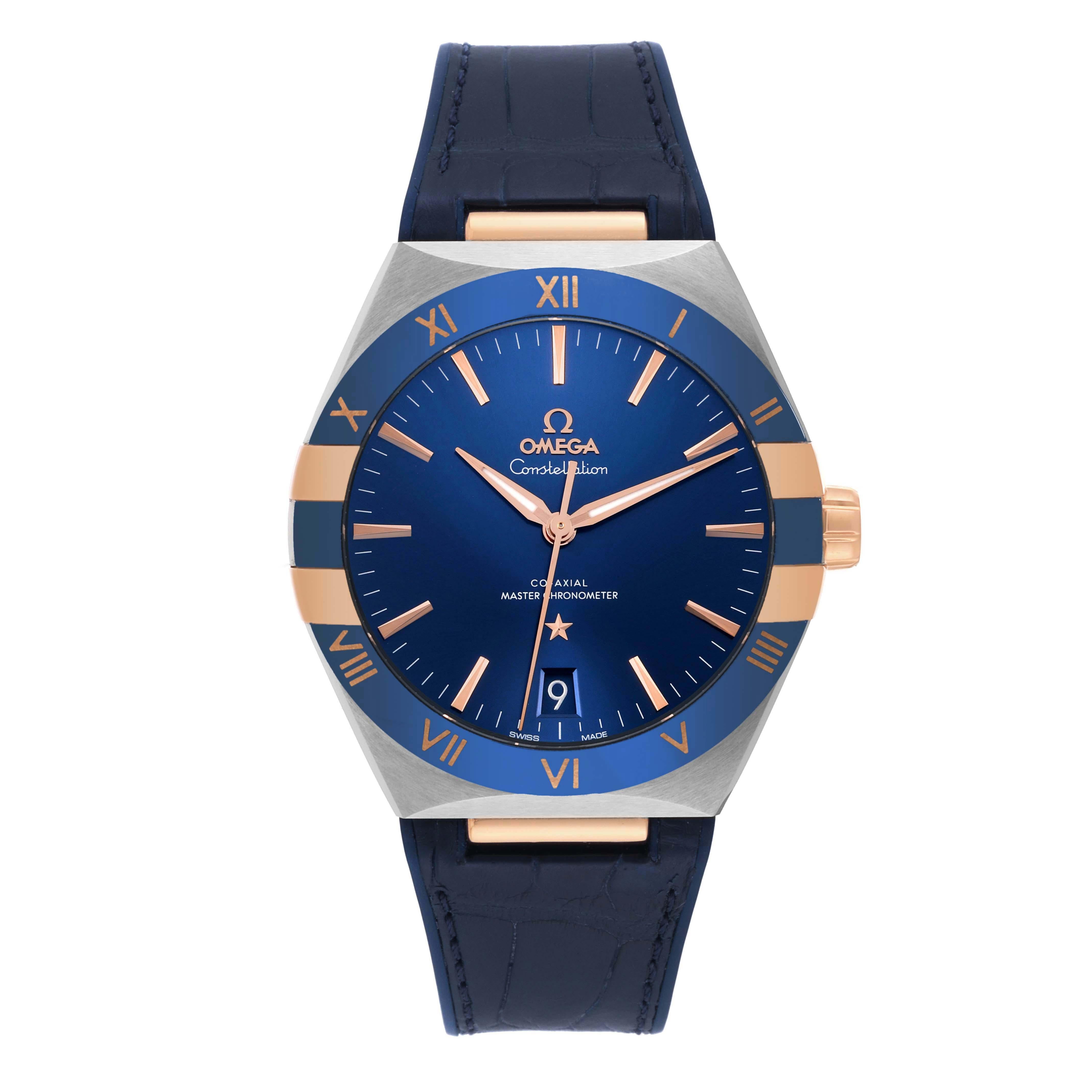 Omega Constellation 41mm Steel Rose Gold Mens Watch 131.23.41.21.03.001 Box Card. Automatic self-winding Co-Axial escapement movement. Stainless steel case 41.0 mm in diameter. Omega logo on an 18k rose gold crown. Blue ceramic bezel with rose gold