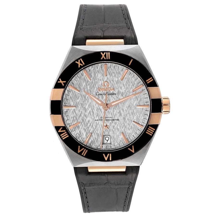 Omega Constellation 41mm Steel Rose Gold Mens Watch 131.23.41.21.06.001 Box Card. Automatic self-winding Co-Axial Escapement movement. Stainless steel and 18K rose gold case 41.0 mm in diameter. Omega logo on a 18K rose gold crown. Black ceramic