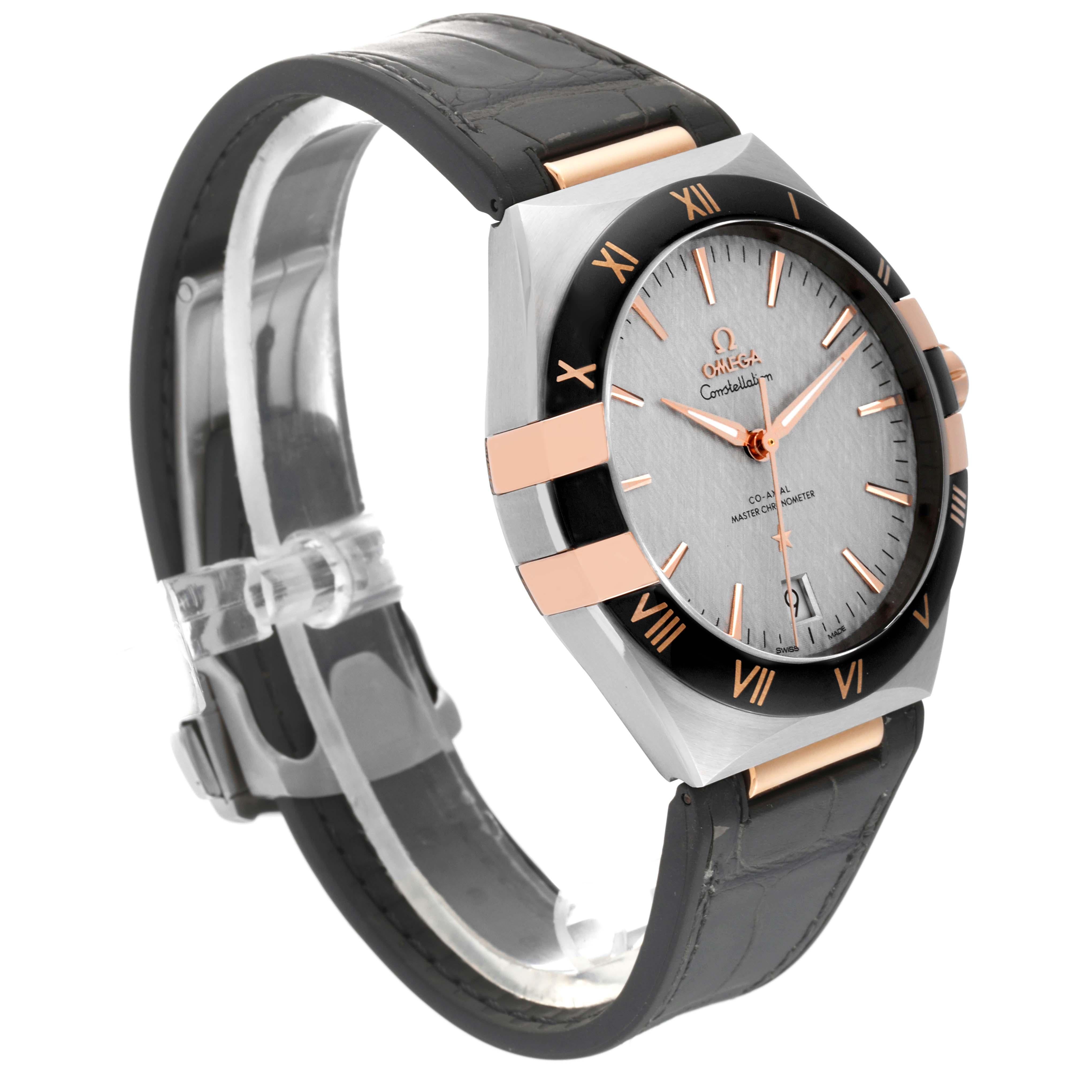 Omega Constellation 41mm Steel Rose Gold Mens Watch 131.23.41.21.06.001 Unworn. Automatic self-winding Co-Axial Escapement movement. Stainless steel and 18K rose gold case 41.0 mm in diameter. Omega logo on an 18K rose gold crown. Transparent