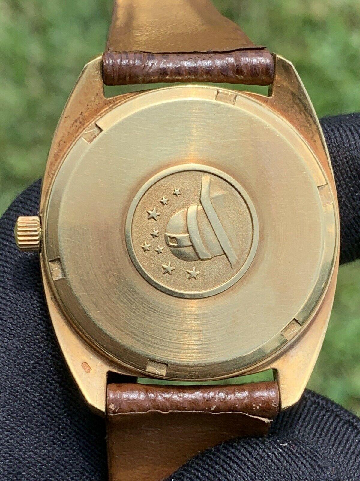 omega constellation day date gold