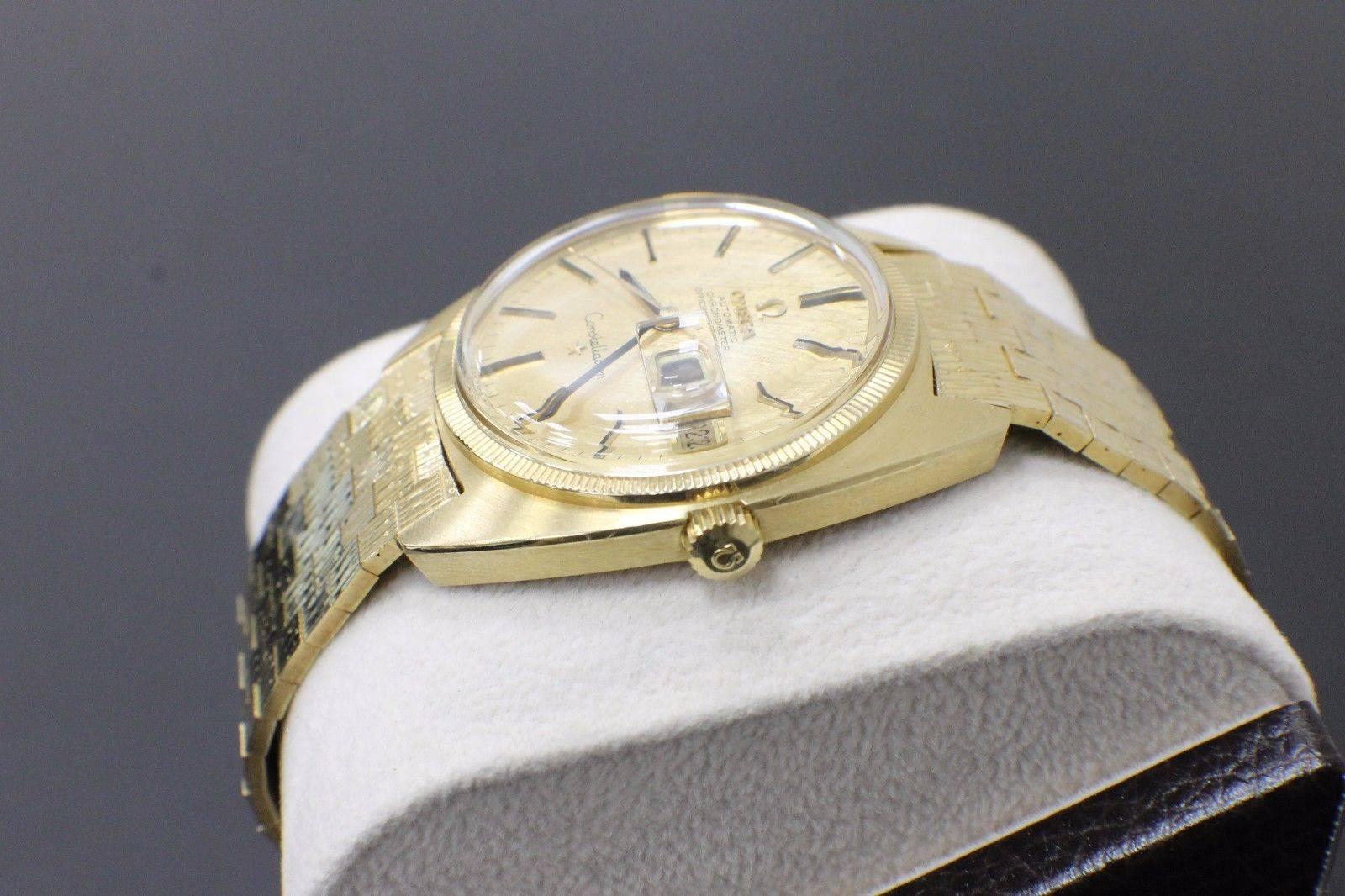 Model: Constellation
 
Case Material: 18K Yellow Gold
 
Band: 18K Yellow Gold
 
Bezel: 18K Yellow Gold
 
Dial: Champagne
 
Face: Acrylic
 
Case Size: 35mm Approx
 
Includes: 
-Elegant Watch Box
-Certified Appraisal 
-6 Month Warranty