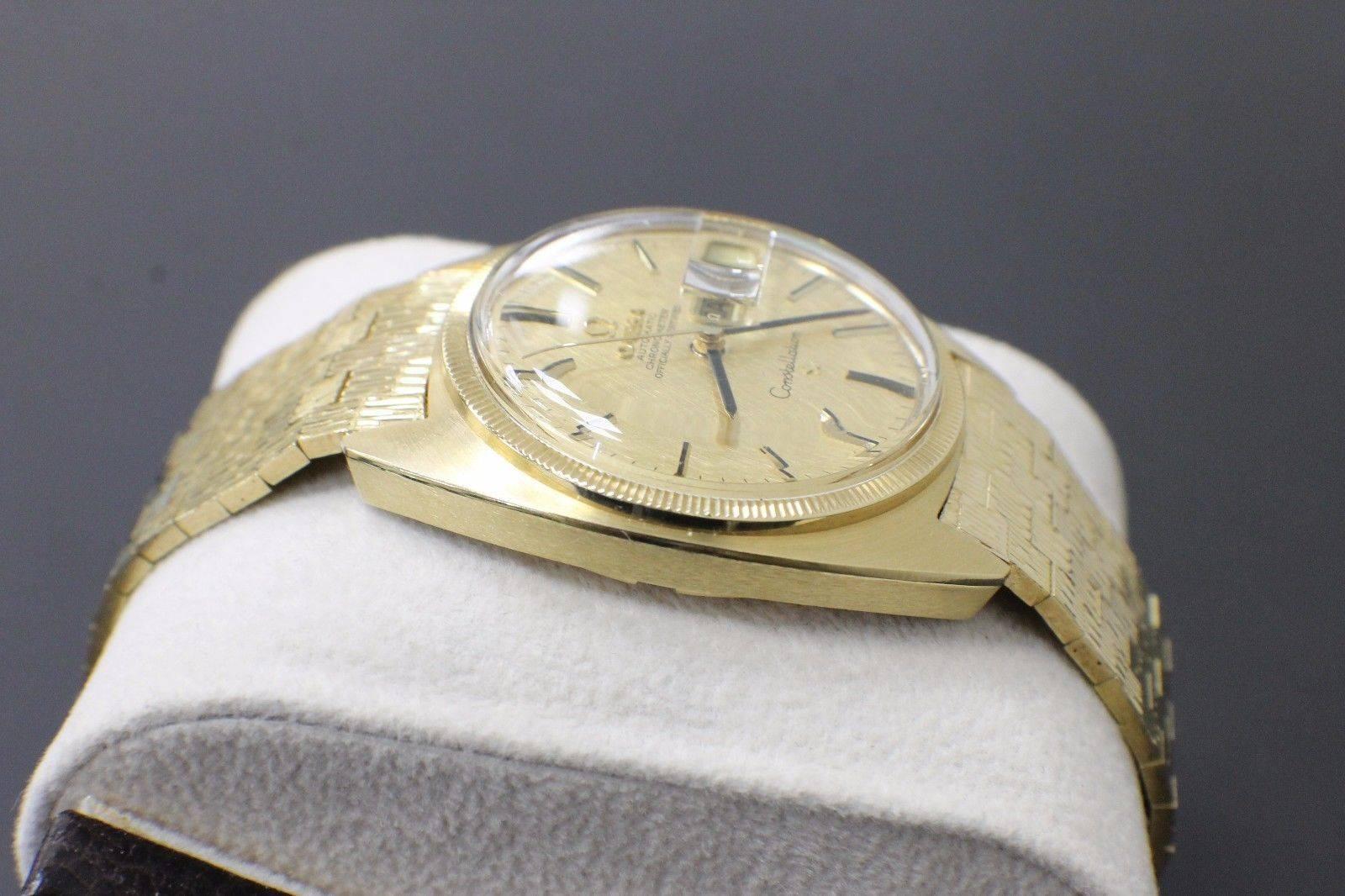 omega constellation day date gold