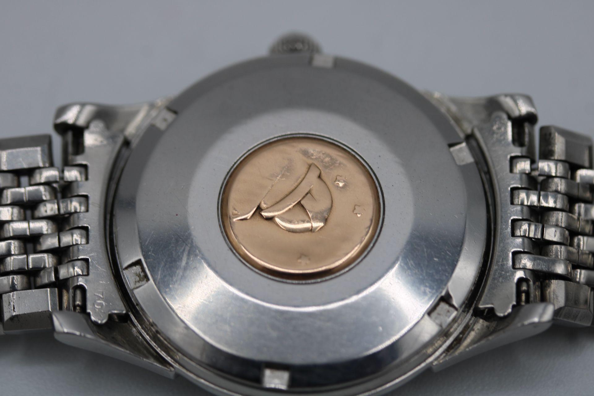 This Omega Constellation 14393 is original and complete.  Although the dial shows some marks, it is clearly an original Cross Hair Pie Pan dial with Gold coloured hour markers and hands. In addition, it is fitted to what we believe to be its