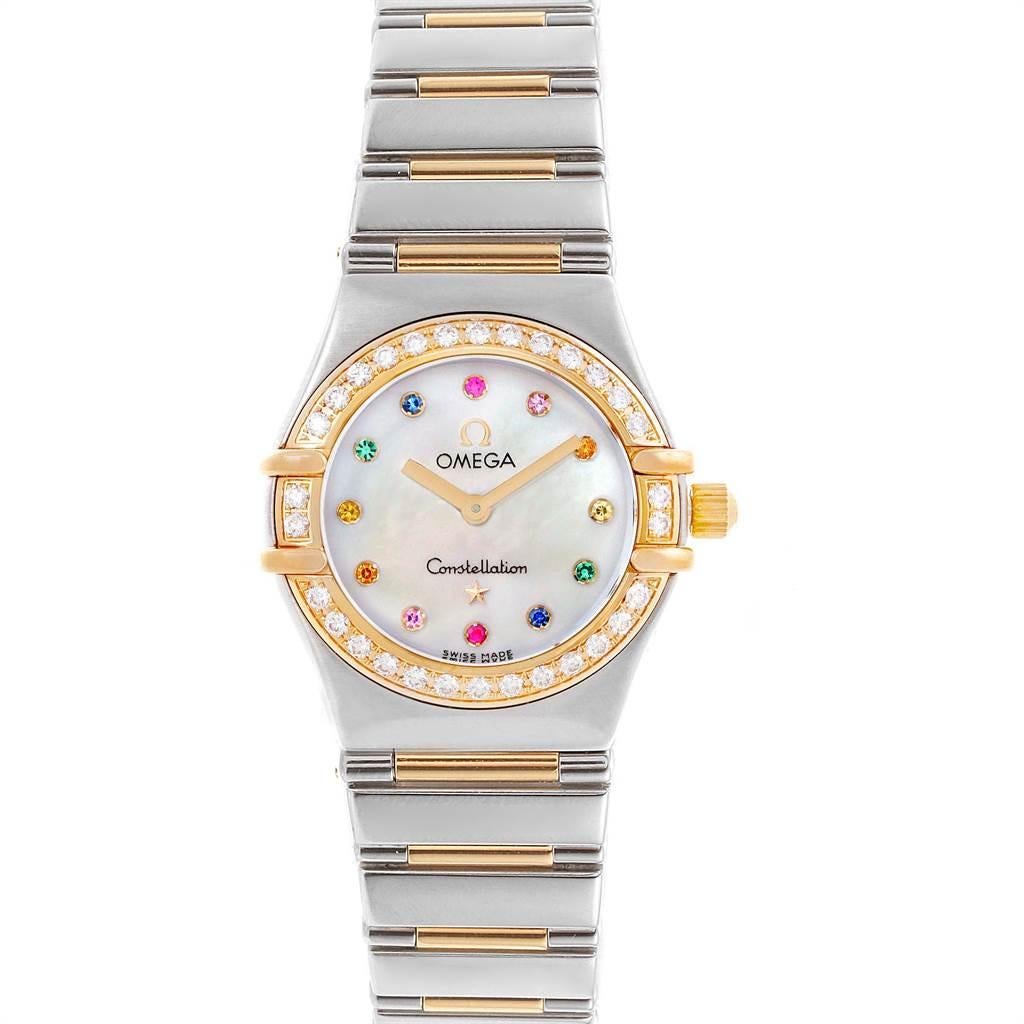 Omega Constellation Iris Steel Yellow Gold Multi Stone Watch 1365.79.00. Quartz movement. Stainless steel and 18k yellow gold round case 22.5 mm in diameter. 18k yellow gold diamond bezel. Scratch resistant sapphire crystal. Mother-of-pearl dial