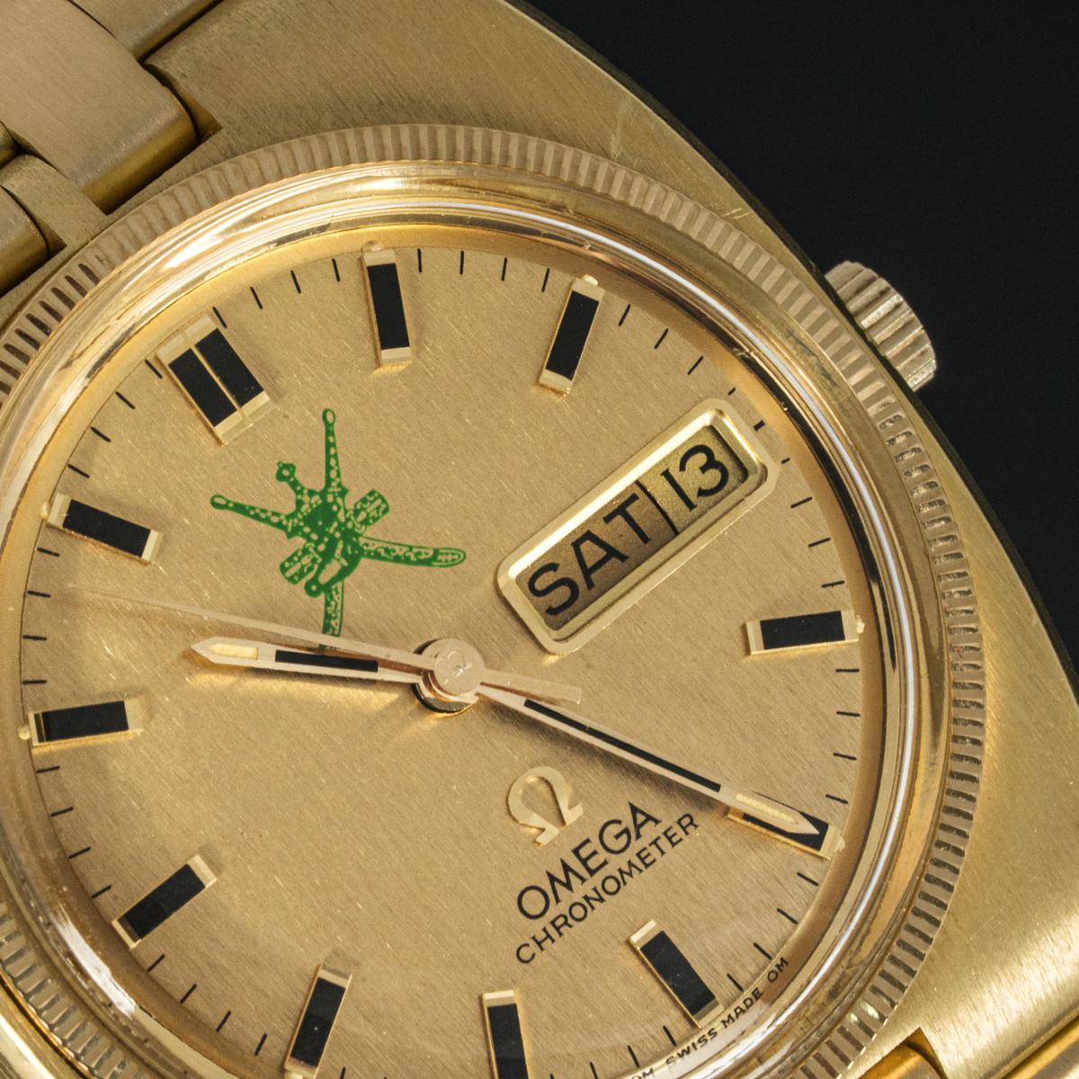 A 36mm Omega Constellation BA 368 crafted in yellow gold by Omega. Featuring a solid yellow gold dial with a date aperture and a distinctive logo of the Khanjar which represents Oman's national emblem.

The watch is also fitted with a plastic glass,