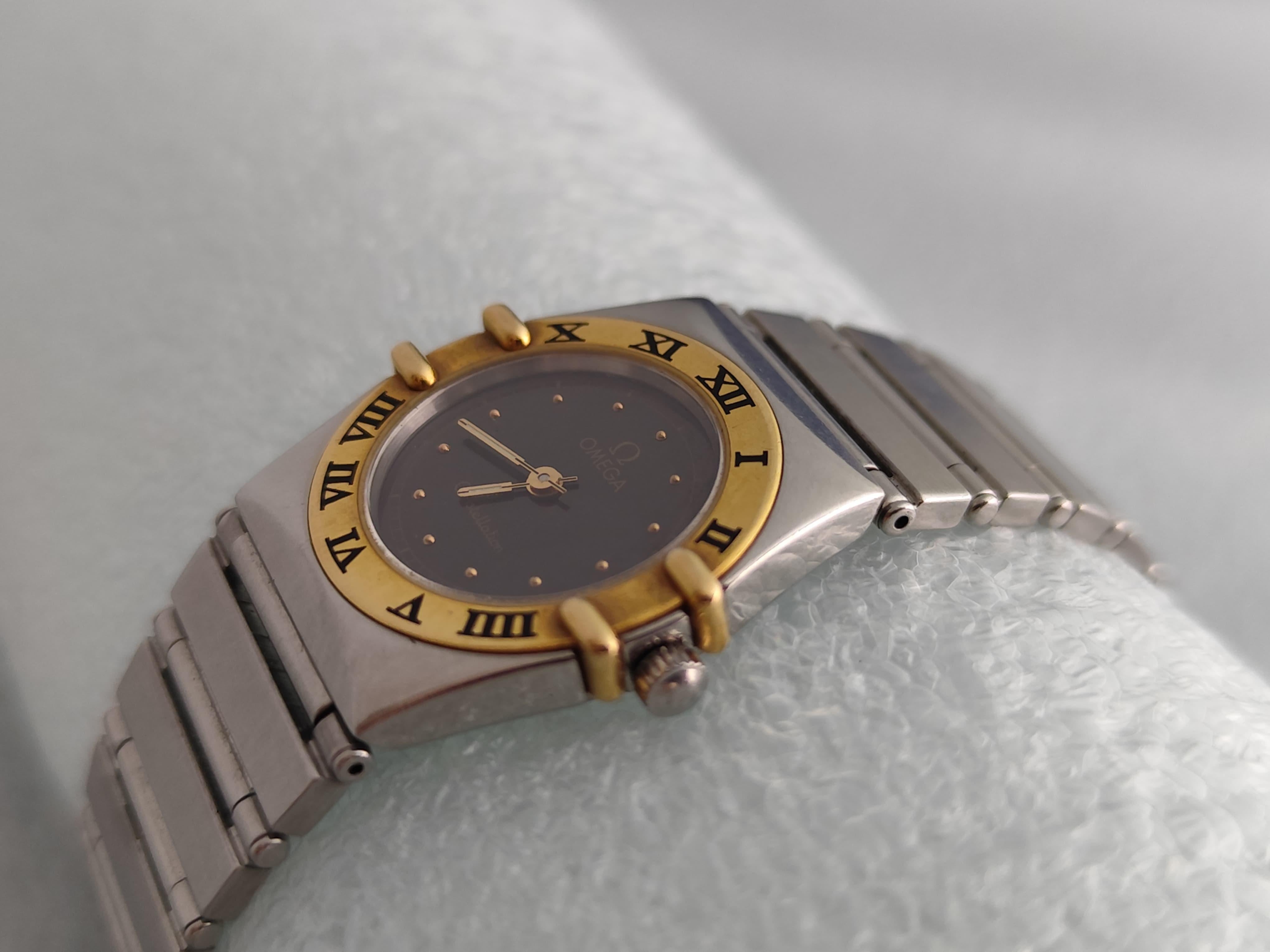 Brand: Omega

Model: Constellation

Reference Number: 7951080

Country Of Manufacture: Switzerland

Movement: Quartz

Case Material: Stainless steel / 18k Gold

Measurements : Case width: 24 mm. (without crown)

Band Type : Stainless steel /