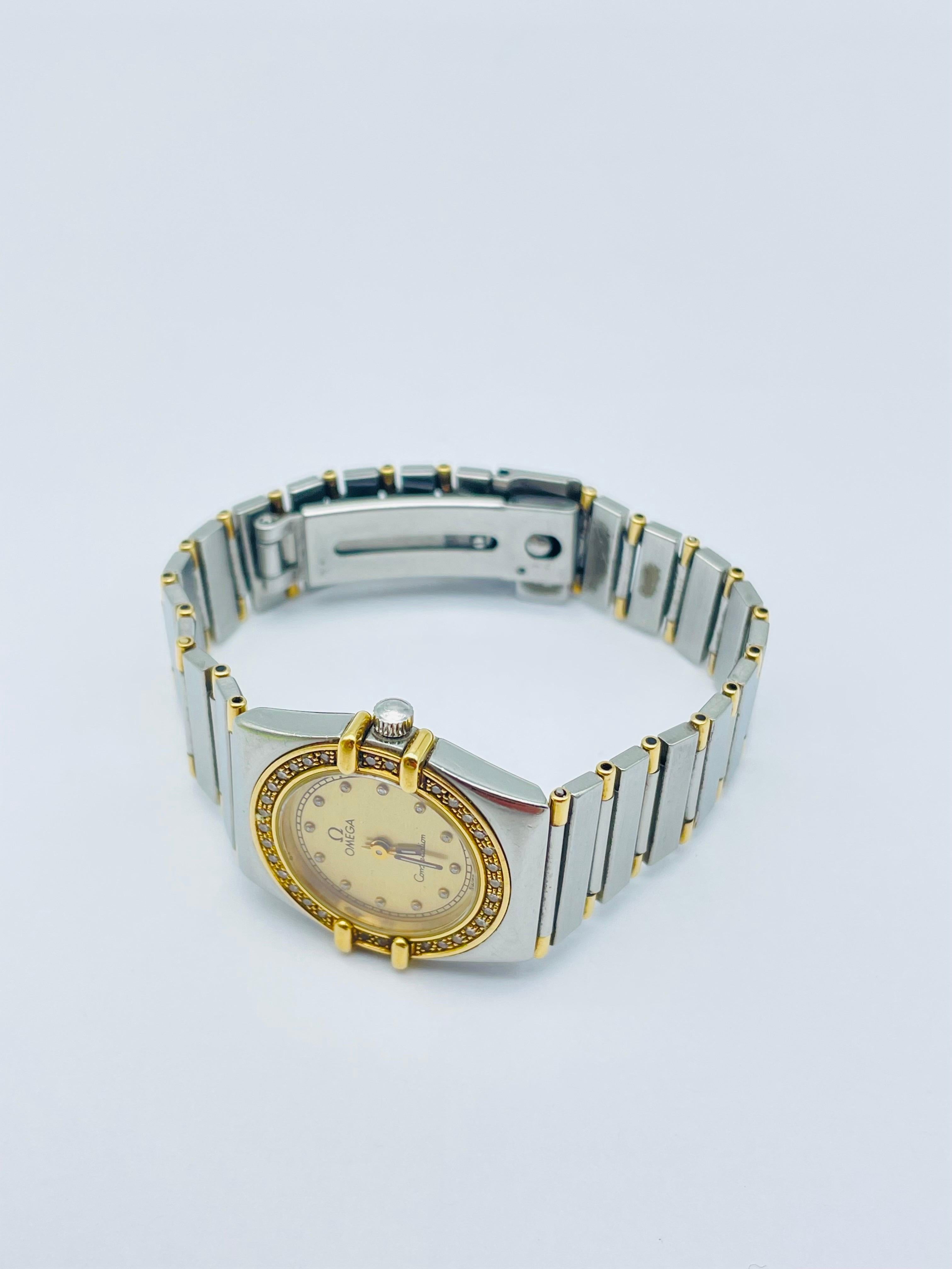 Taille brillant Omega Constellation Montre pour femme avec lunette en acier et or et diamants 15078 en vente