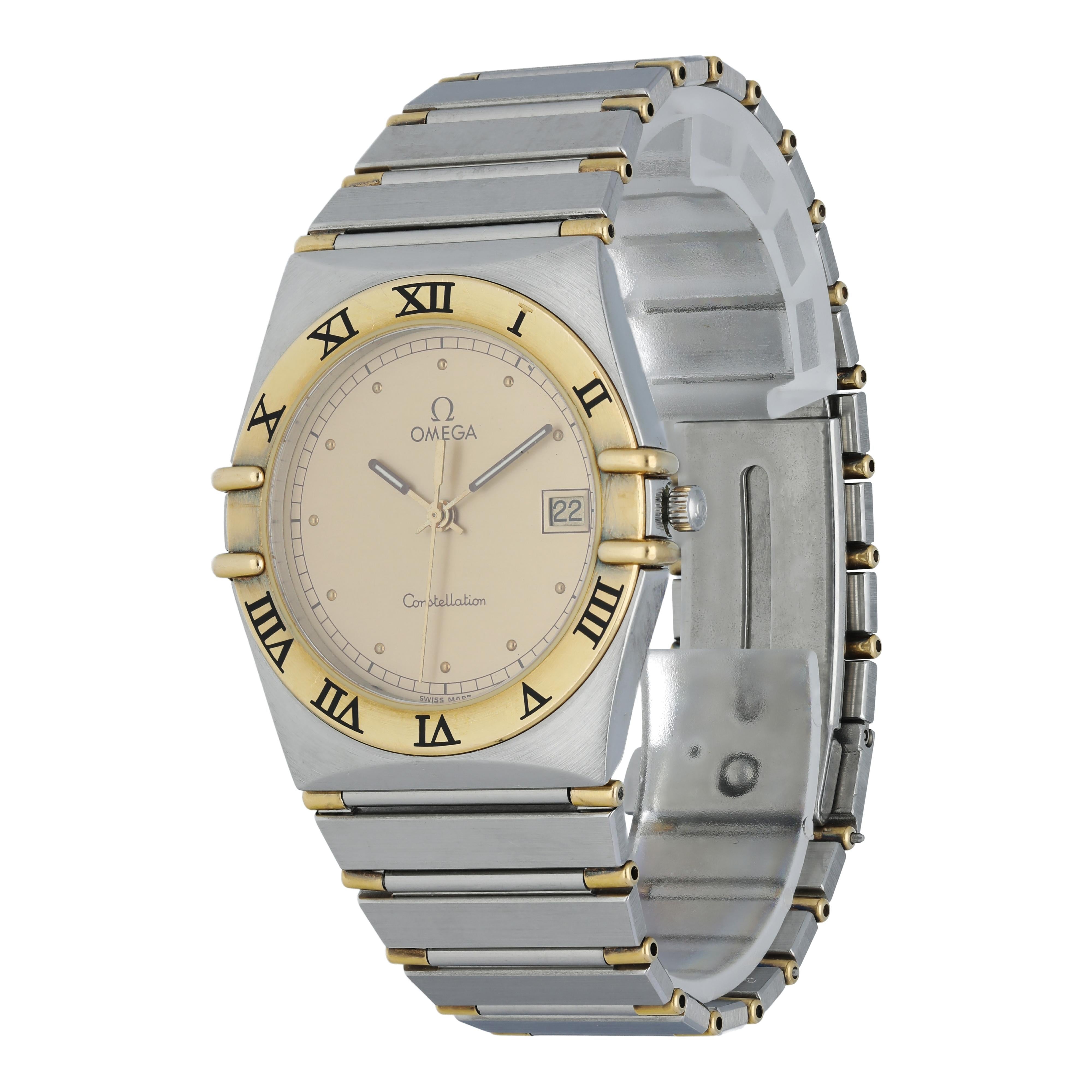 Omega Constellation Men's Watch
32mm Stainless Steel case. 
Yellow Gold Roman numeral bezel. 
Champagne dial with Luminous Steel hands and dot hour markers. 
Minute markers on the outer dial. 
Date display at the 3 o'clock position. 
Stainless Steel