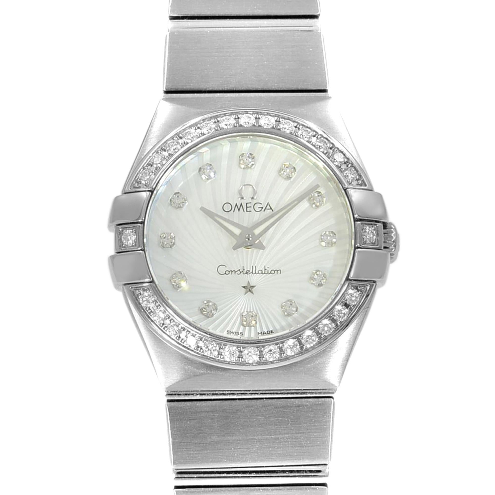 This display model Omega Constellation  123.15.24.60.55.002 is a beautiful Ladies timepiece that is powered by a quartz movement which is cased in a stainless steel case. It has a round shape face, diamonds dial and has hand diamonds style markers.
