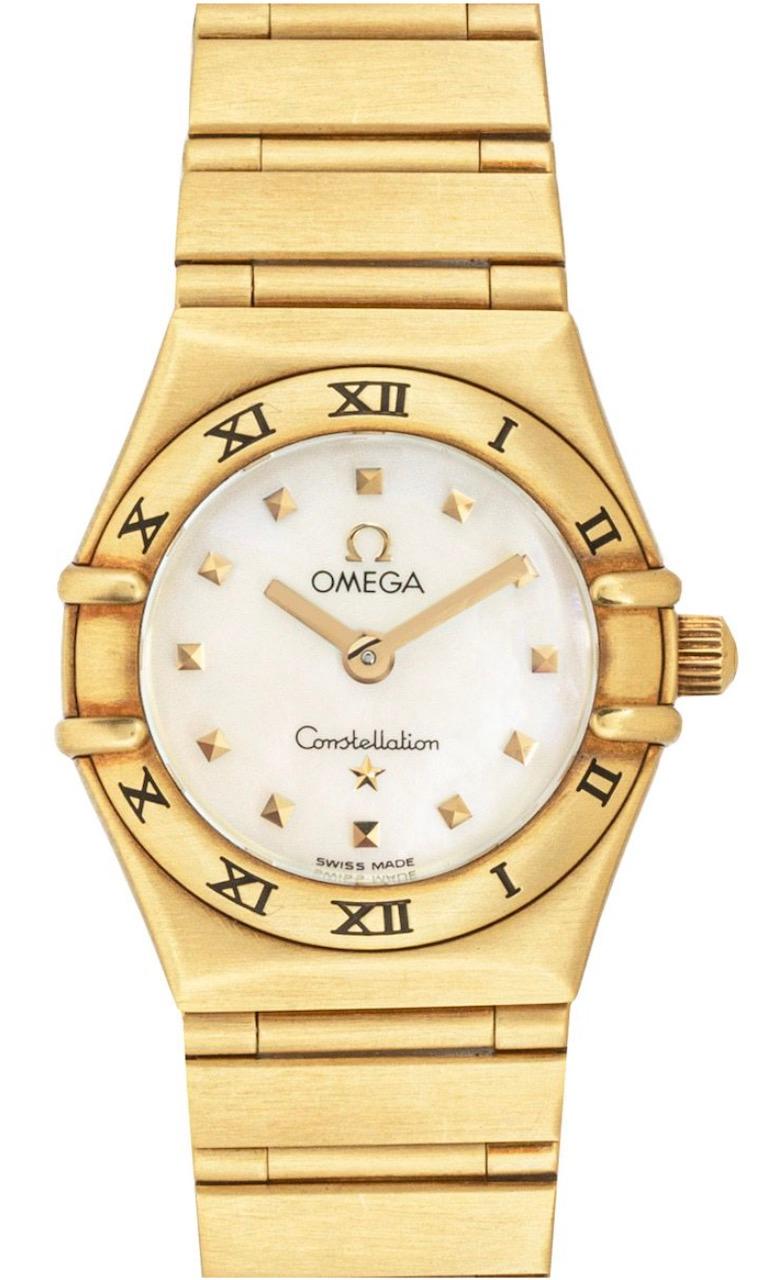 A ladies yellow gold Constellation wristwatch by Omega. Featuring a stunning white mother of pearl dial with applied pyramid style hour markers and a yellow gold bezel set with roman numerals. Equipped with a yellow gold bracelet and deployant
