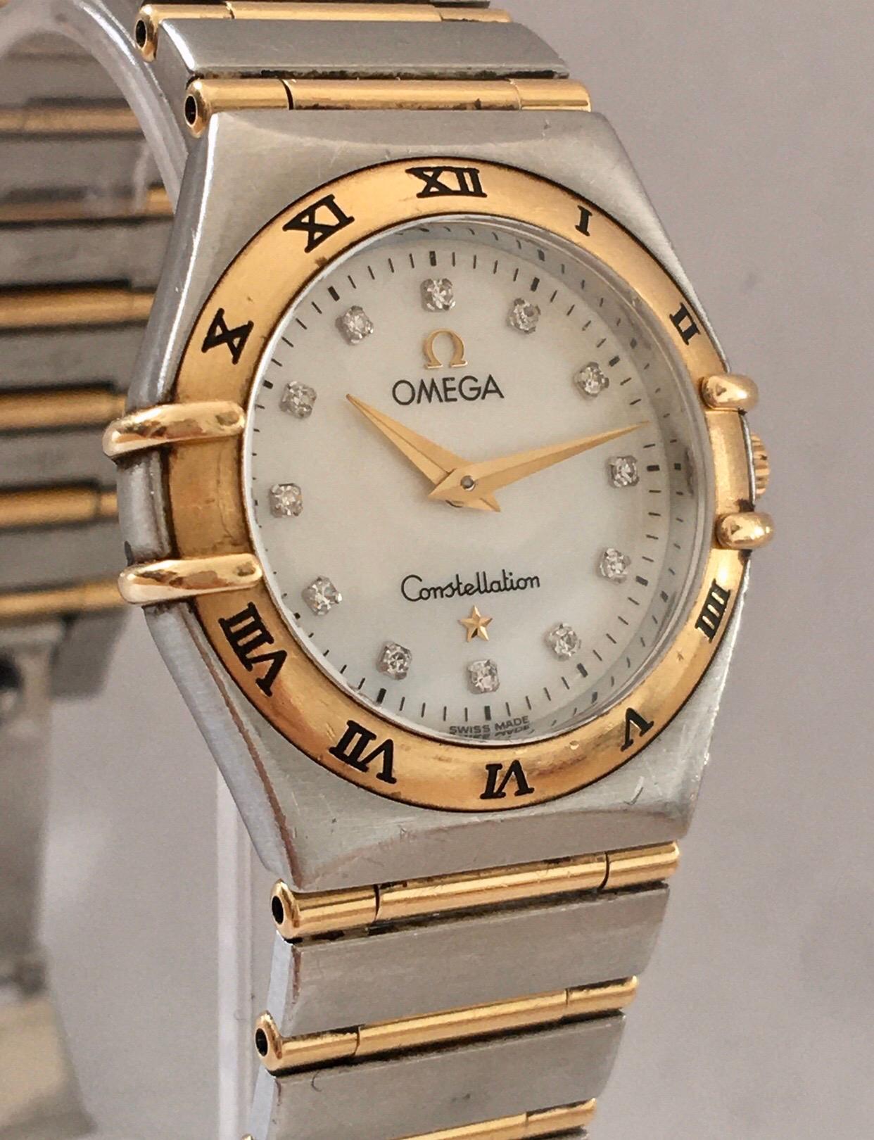 This stunning pre-own Swiss Made Watch is in good working condition. It features a beautiful White Dial Set with Diamonds and powered by a battery Operated Movement. It comes with a brushed Solid 18k Gold with Steel Case & Bracelet and a scratch