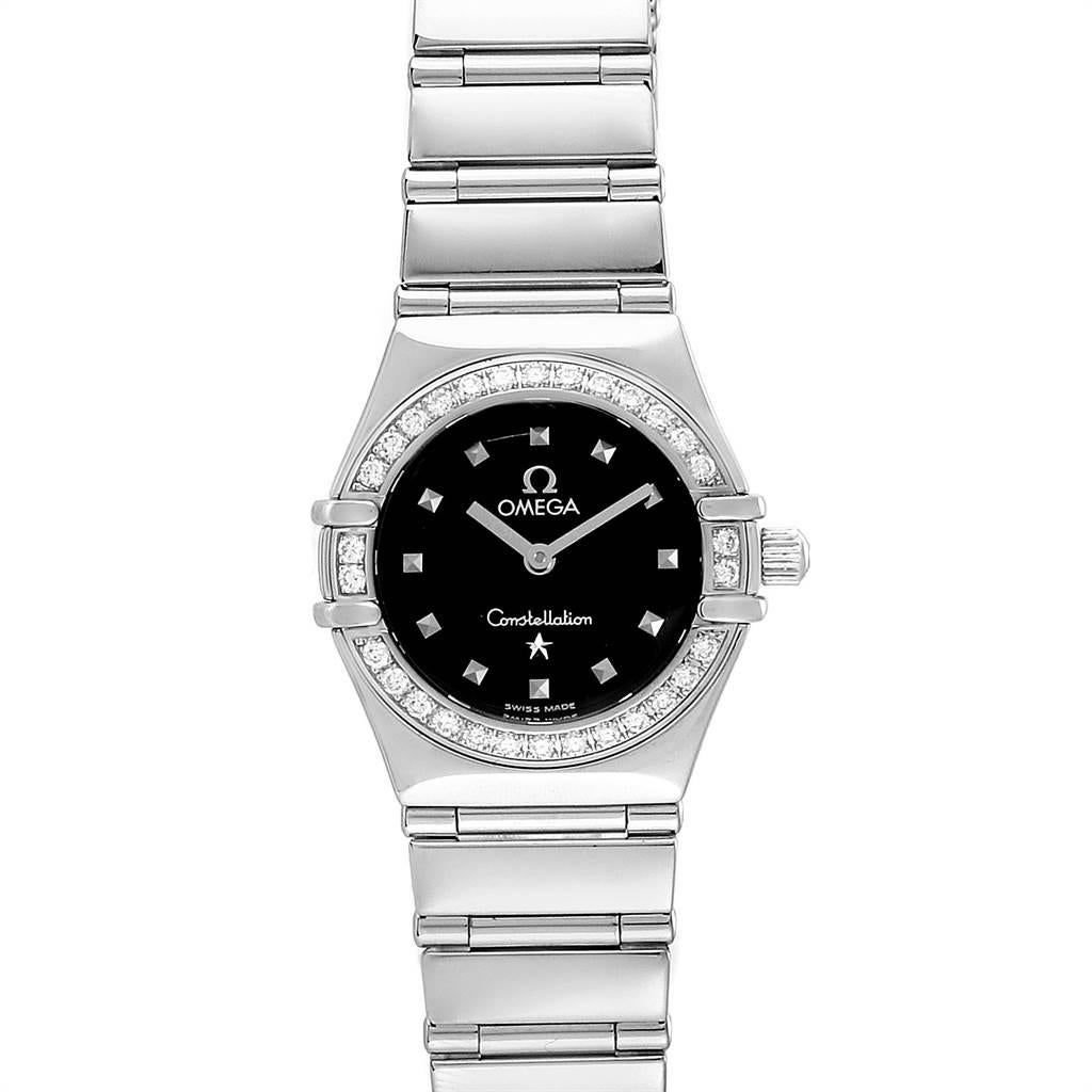 Omega Constellation My Choice Mini Ladies Diamond Watch 1465.51.00. Quartz movement. Stainless steel round case 22.5 mm in diameter. Stainless steel diamond bezel. Scratch resistant sapphire crystal. Black dial with pyramid hour markers. Stainless