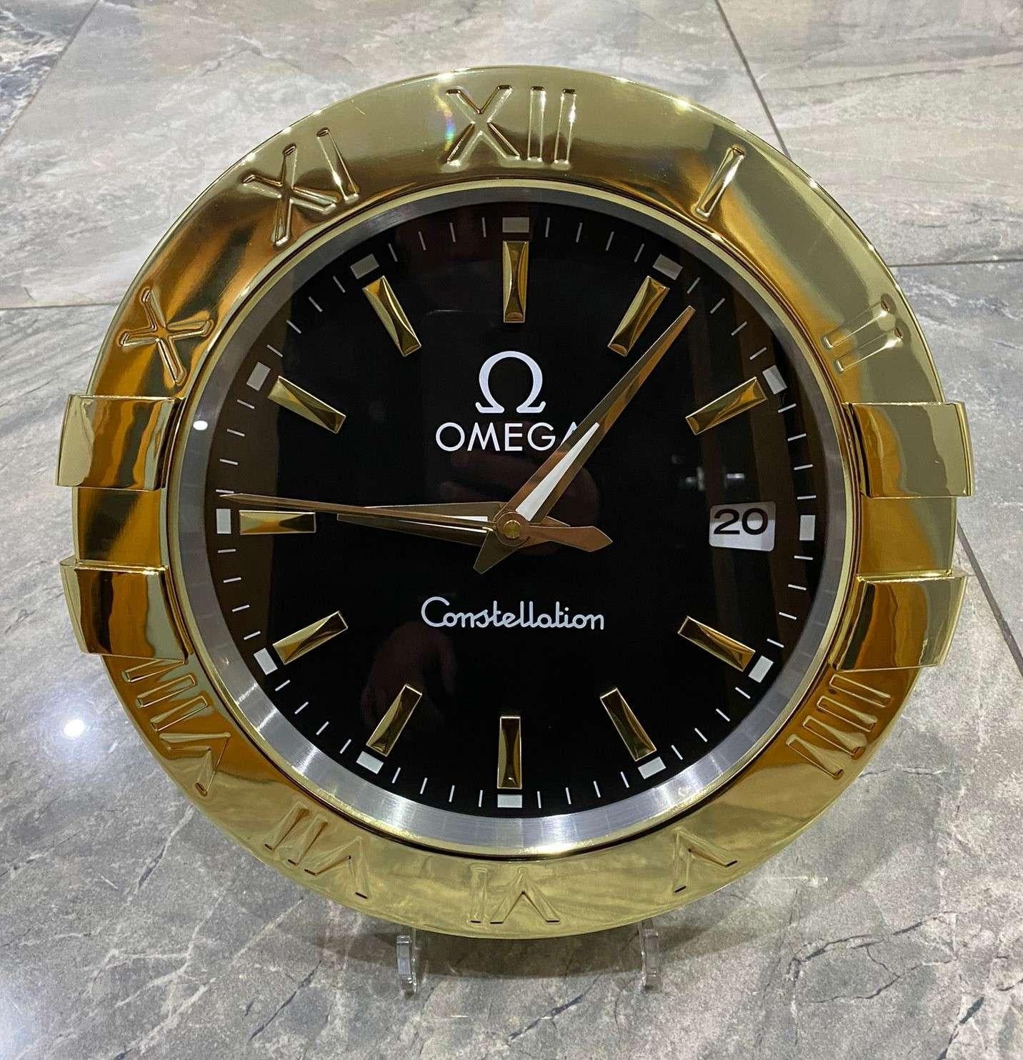 Omega Constellation Officially Certified Black & Gold Wall Clock. With luminous hands, sweeping hands.
Free international shipping.