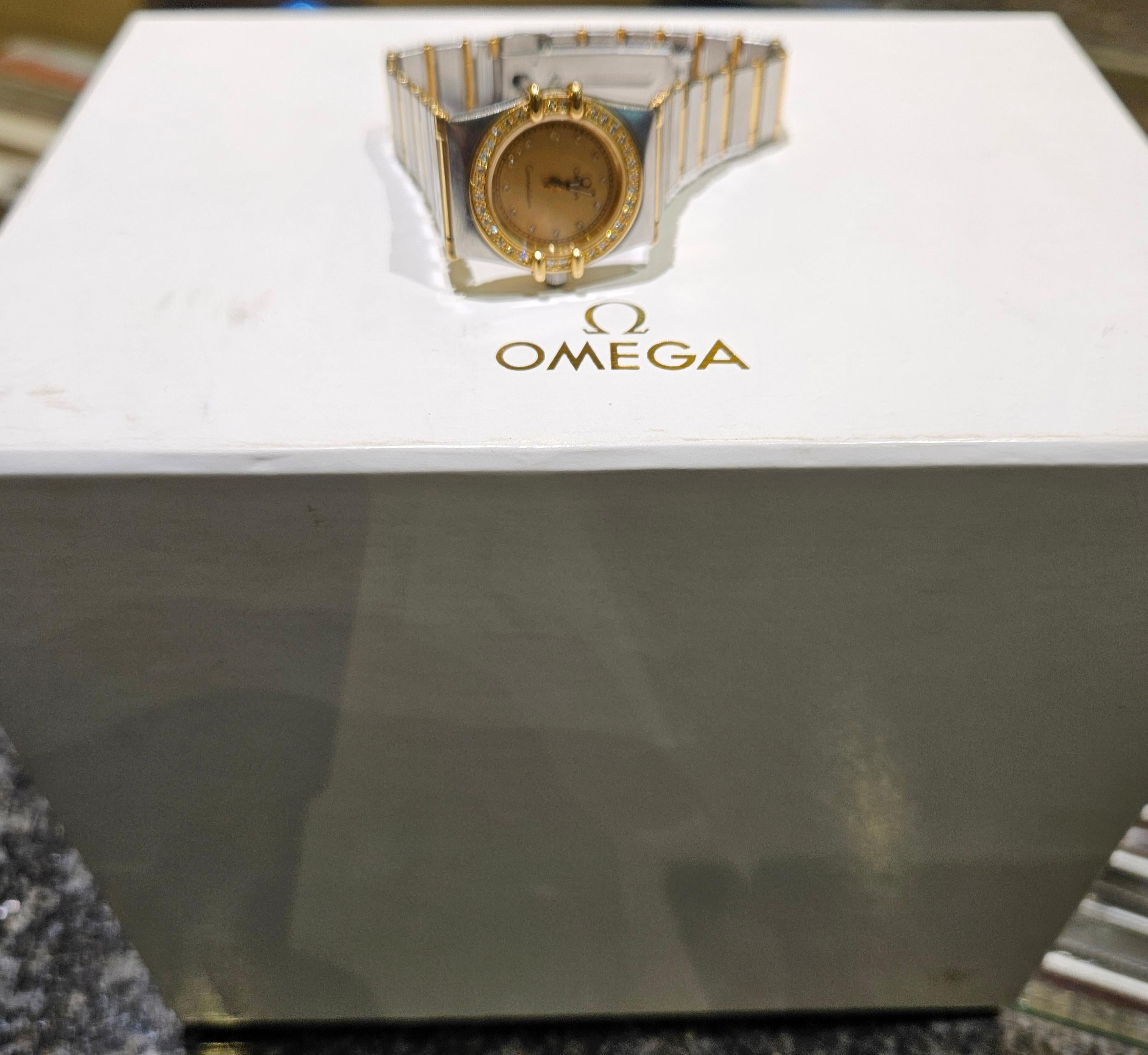 Montre-bracelet Omega Constellation à quartz, or et acier, diamètre 24 mm en vente 11
