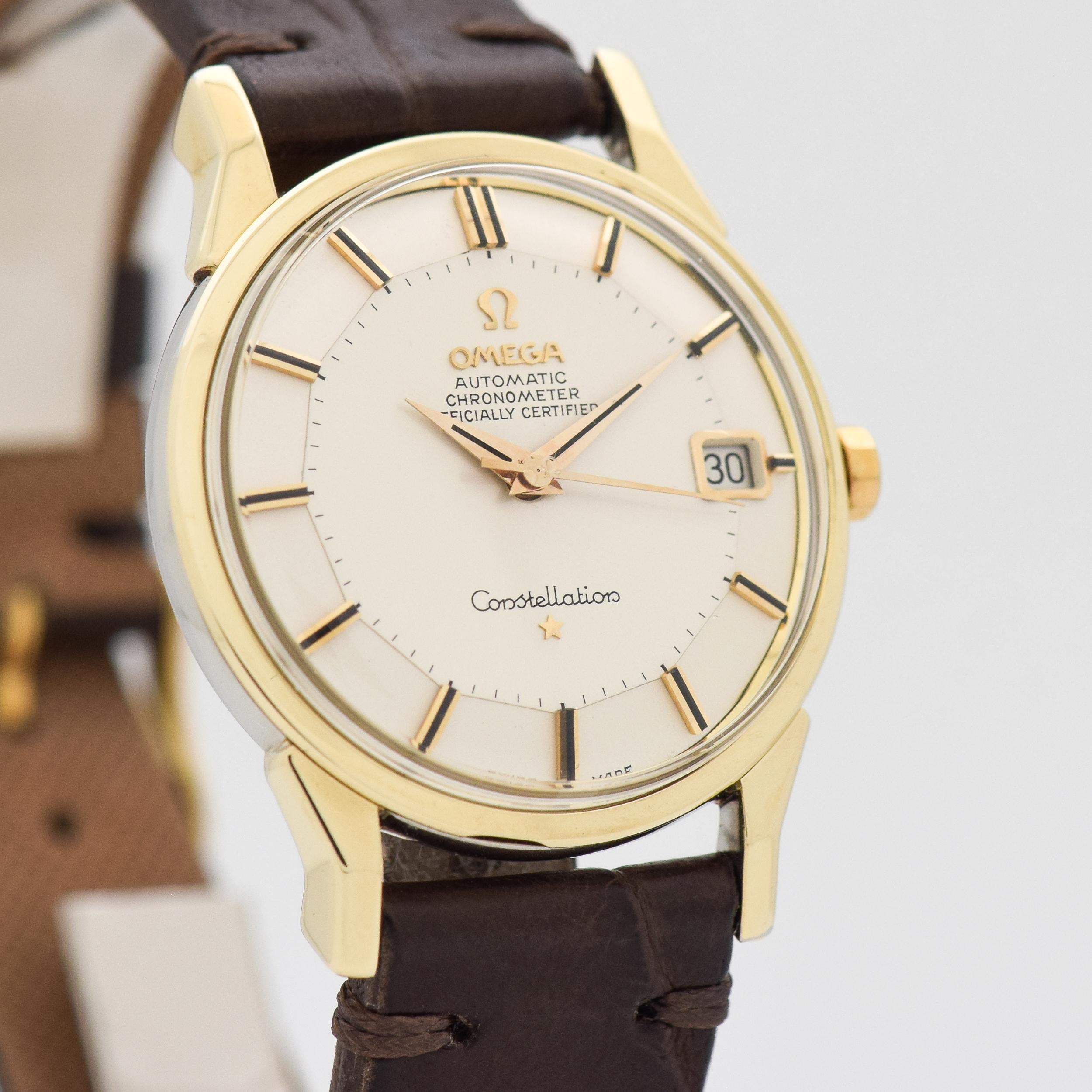 1963 Vintage Omega Constellation Ref. 168.005 14k Yellow Gold Shell Over Stainless Steel with Stainless Steel Case Back with Desirable Original Silver Pie Pan Dial with Applied Gold Color Beveled Stick/Bar/Baton Markers. 33mm x 42mm lug to lug (1.3