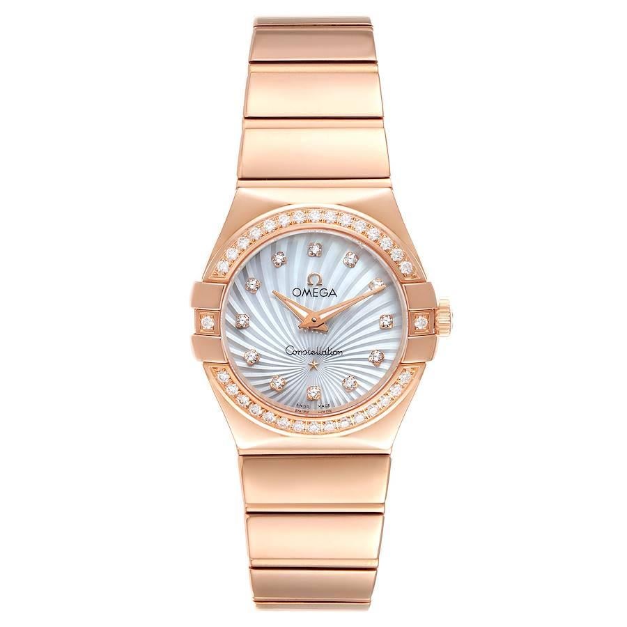 Omega Constellation Rose Gold MOP Diamond Ladies Watch 123.55.24.60.55.005. Quartz movement. 18k rose gold round case 24 mm in diameter. 18k rose gold original Omega diamond bezel. Scratch resistant sapphire crystal. Supernova pattern mother of