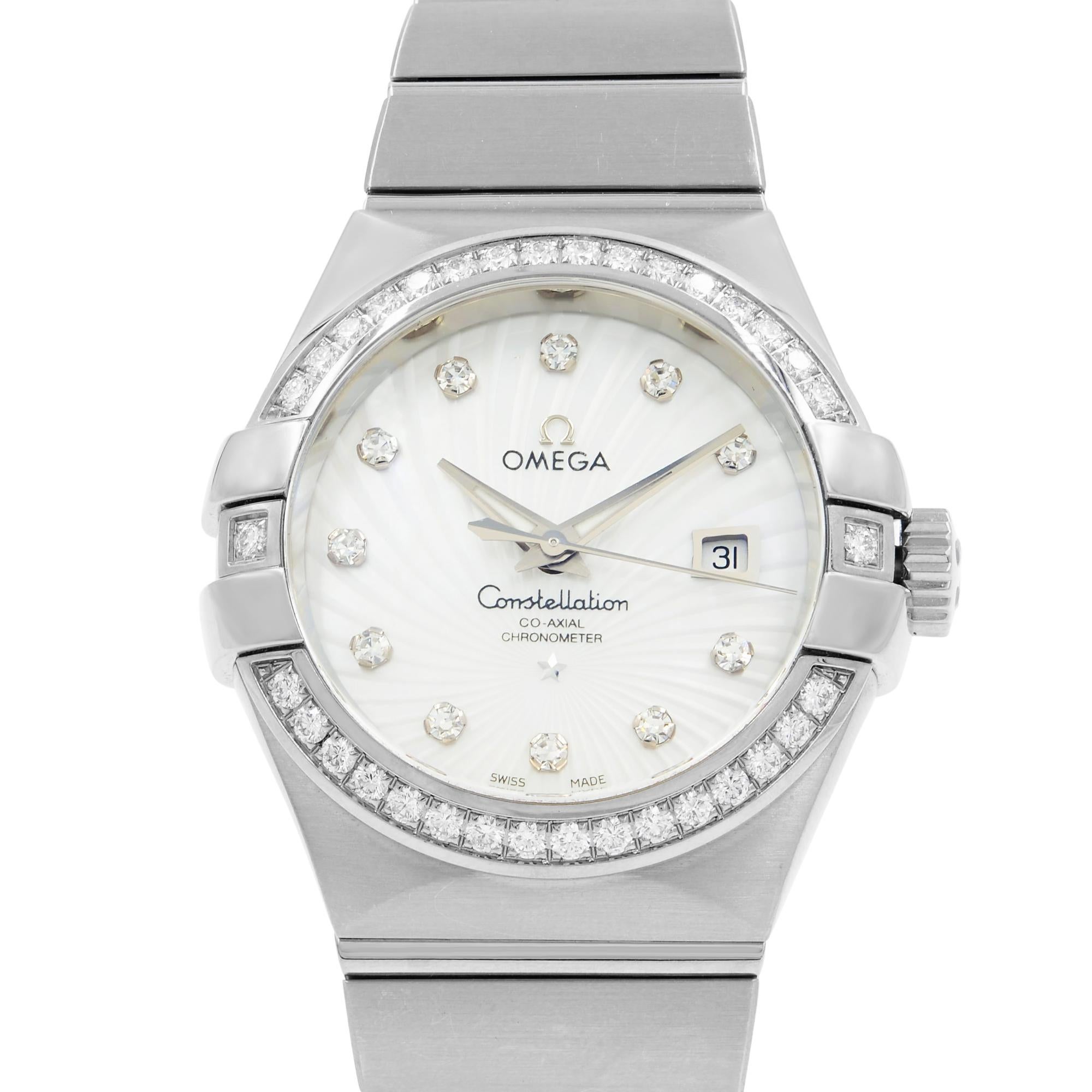 This display model Omega Constellation 123.55.31.20.55.003 is a beautiful Ladies timepiece that is powered by an automatic movement which is cased in a white gold case. It has a round shape face, date, diamonds dial and has hand diamonds style