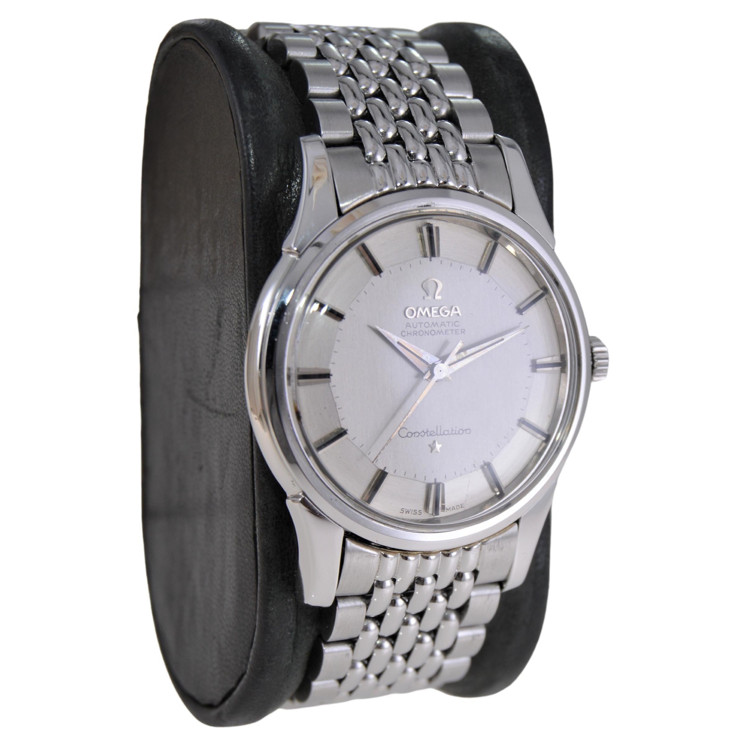 FACTORY / HOUSE: Omega Watch Company
STYLE / REFERENCE: Constellation
METAL / MATERIAL: Stainless Steel
CIRCA / YEAR: 1950's
DIMENSIONS / SIZE: 32mm Length X 44mm Diameter
MOVEMENT / CALIBER: Automatic Winding / 24 Jewels / Caliber 551
DIAL / HANDS: