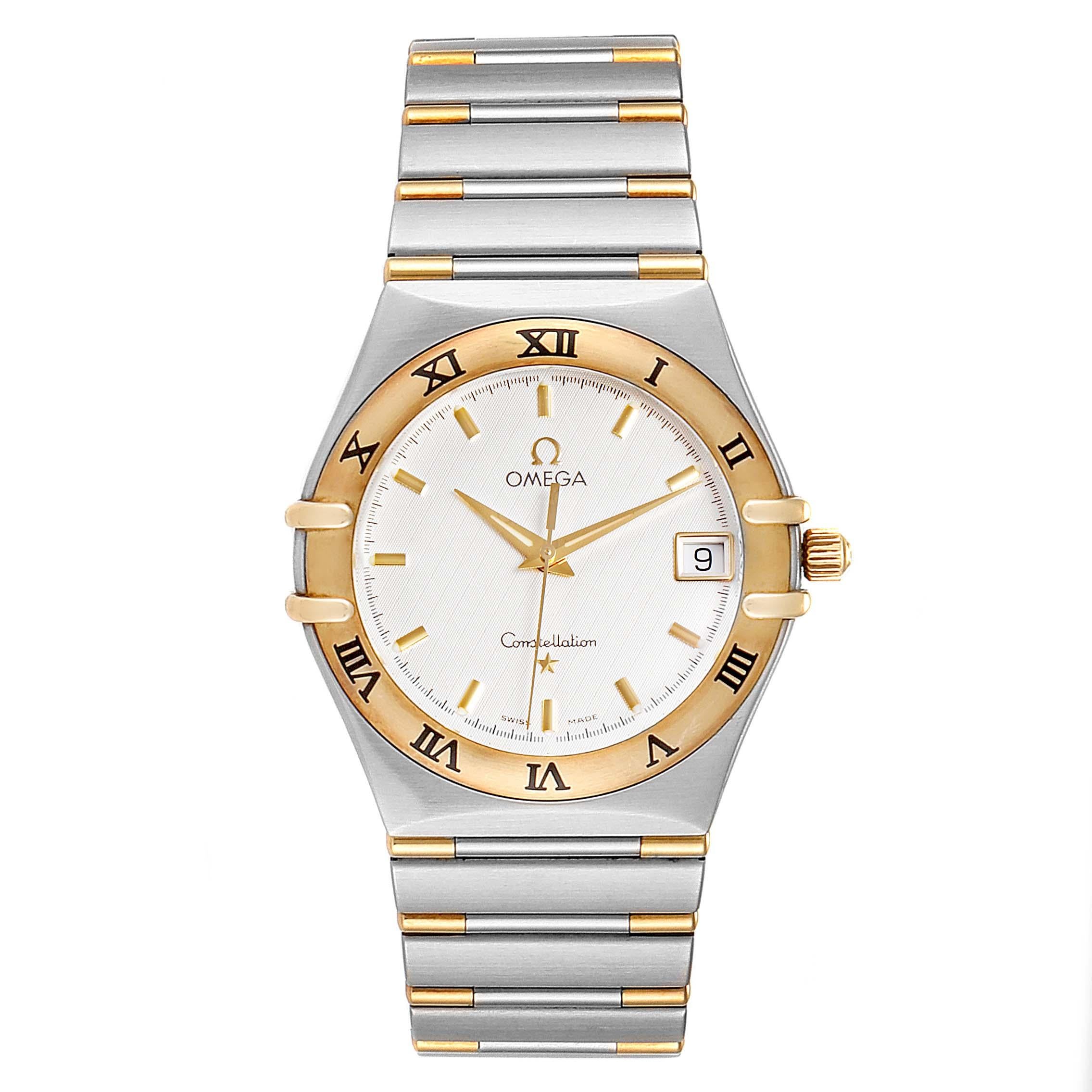 Omega Constellation Steel 18K Yellow Gold Mens Watch 1312.30.00 Card. Quartz movement. Brushed stainless steel and 18K yellow gold case 33.5 mm in diameter. Omega logo on a crown. 18K yellow gold fixed bezel. Scratch resistant anti-reflective