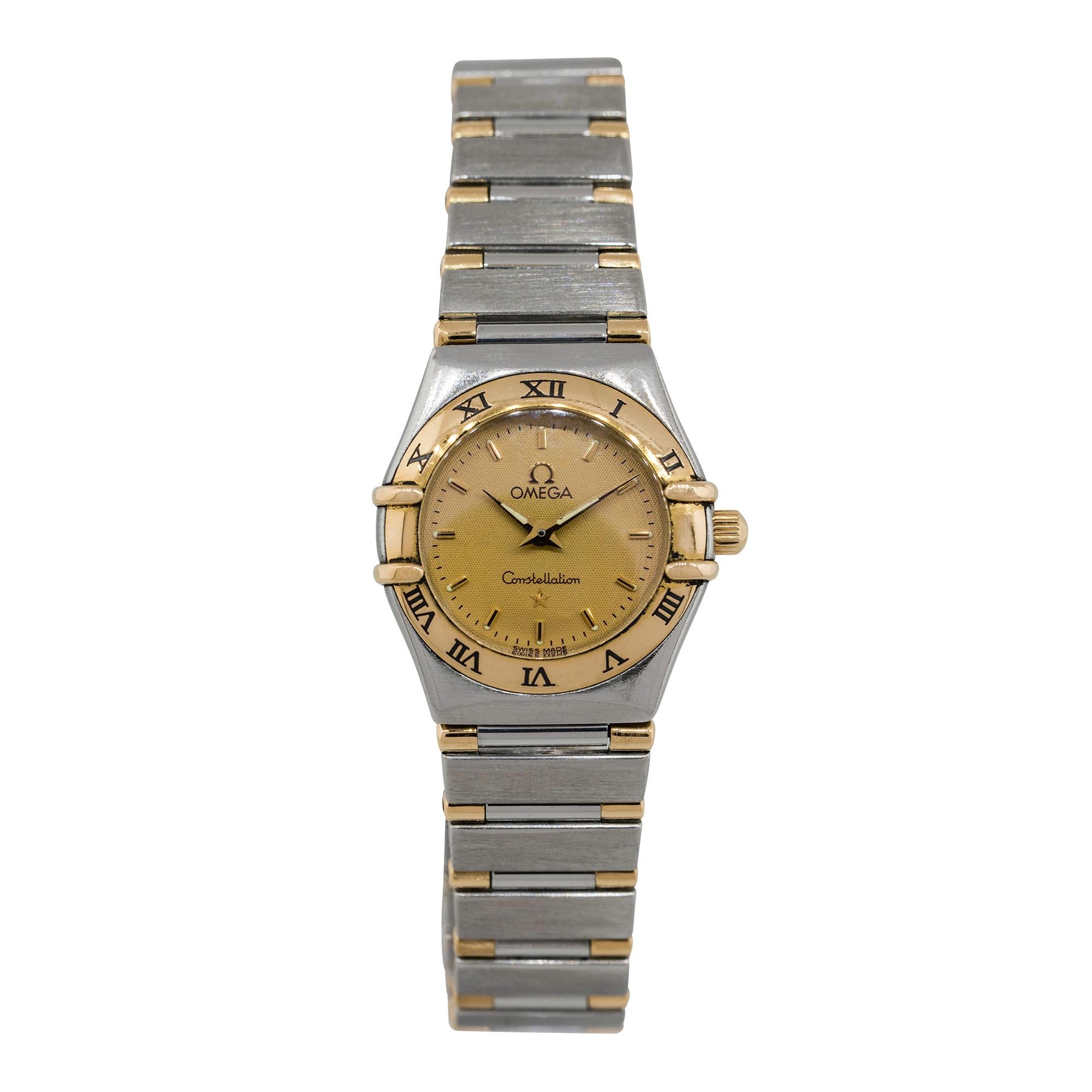 Brand: Omega
MPN: 55218506
Model: Constellation 
Case Material: Stainless steel
Crystal: Sapphire crystal
Bezel: Fixed 18k yellow gold roman numeral bezel
Dial: Gold dial with gold hour markers and hands.
Bracelet: Two tone link Bracelet
Case Size: