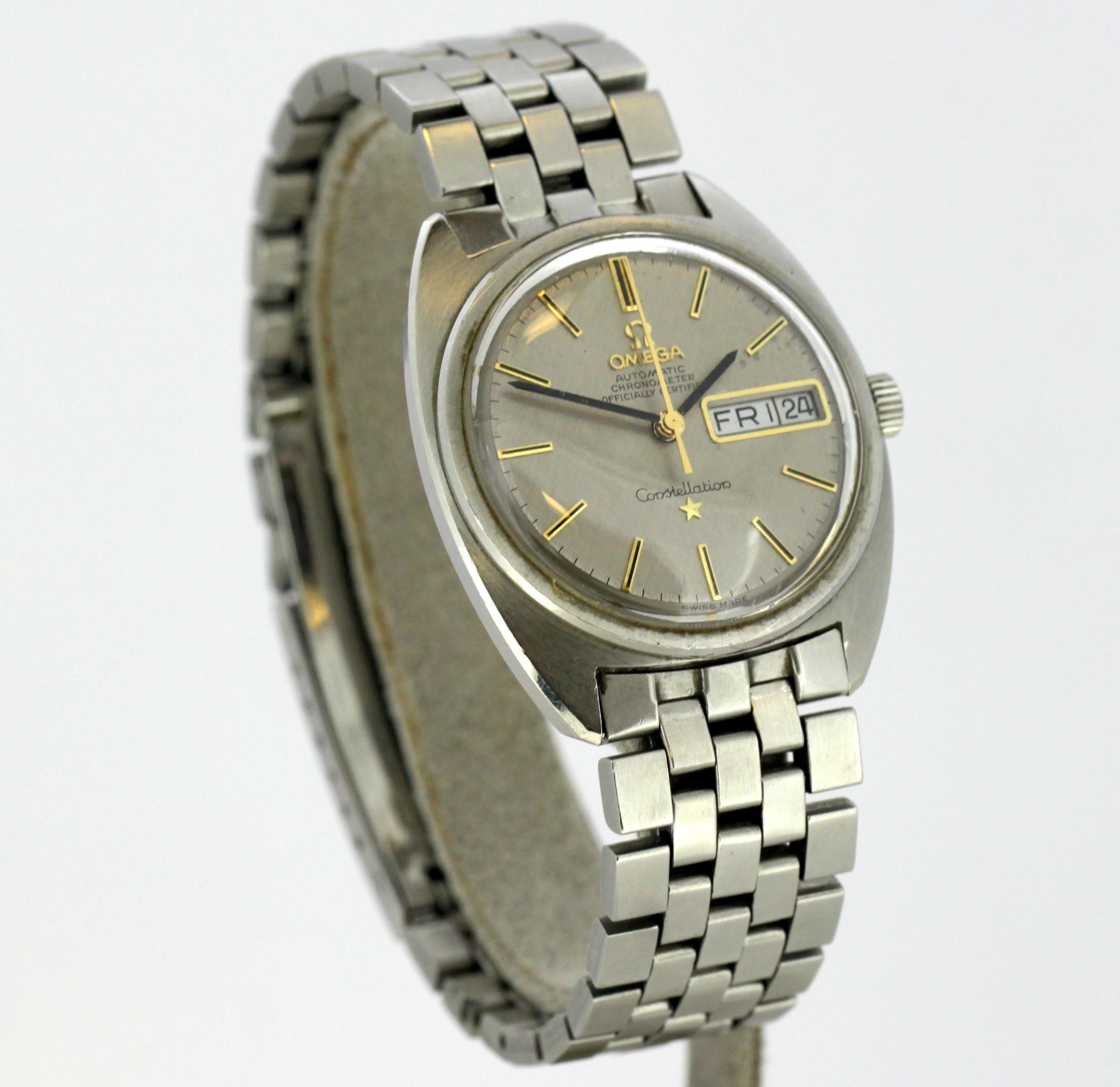 Omega Constellation - Vintage Automatic Chronometer Wristwatch
1970's

Gender:	Men
Functions & Features: Day & Chronometer
Case Diameter: 35 mm
Movement: Automatic
Watchband Material: Steel
Display Type:	Analogue	
Age:	 1970's
Dial : (See