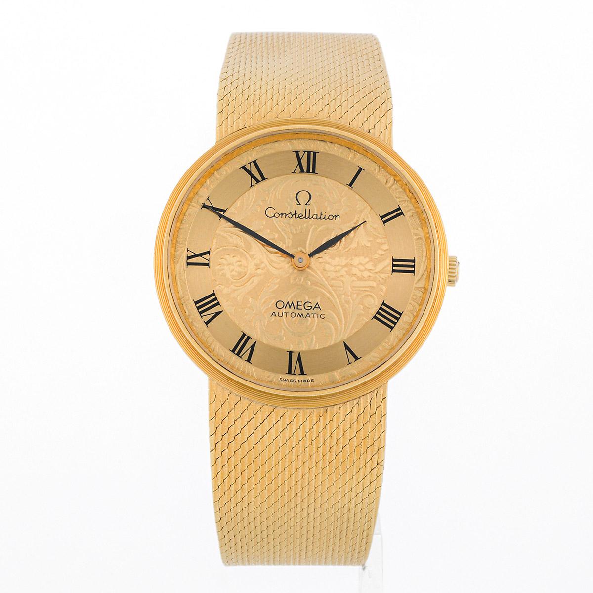 This beautiful women's Omega Constellation is a rare vintage collectible. The case, bracelet, and dial are crafted in 18k gold.

The dial features a delicate embossed floral design and black roman numerals.