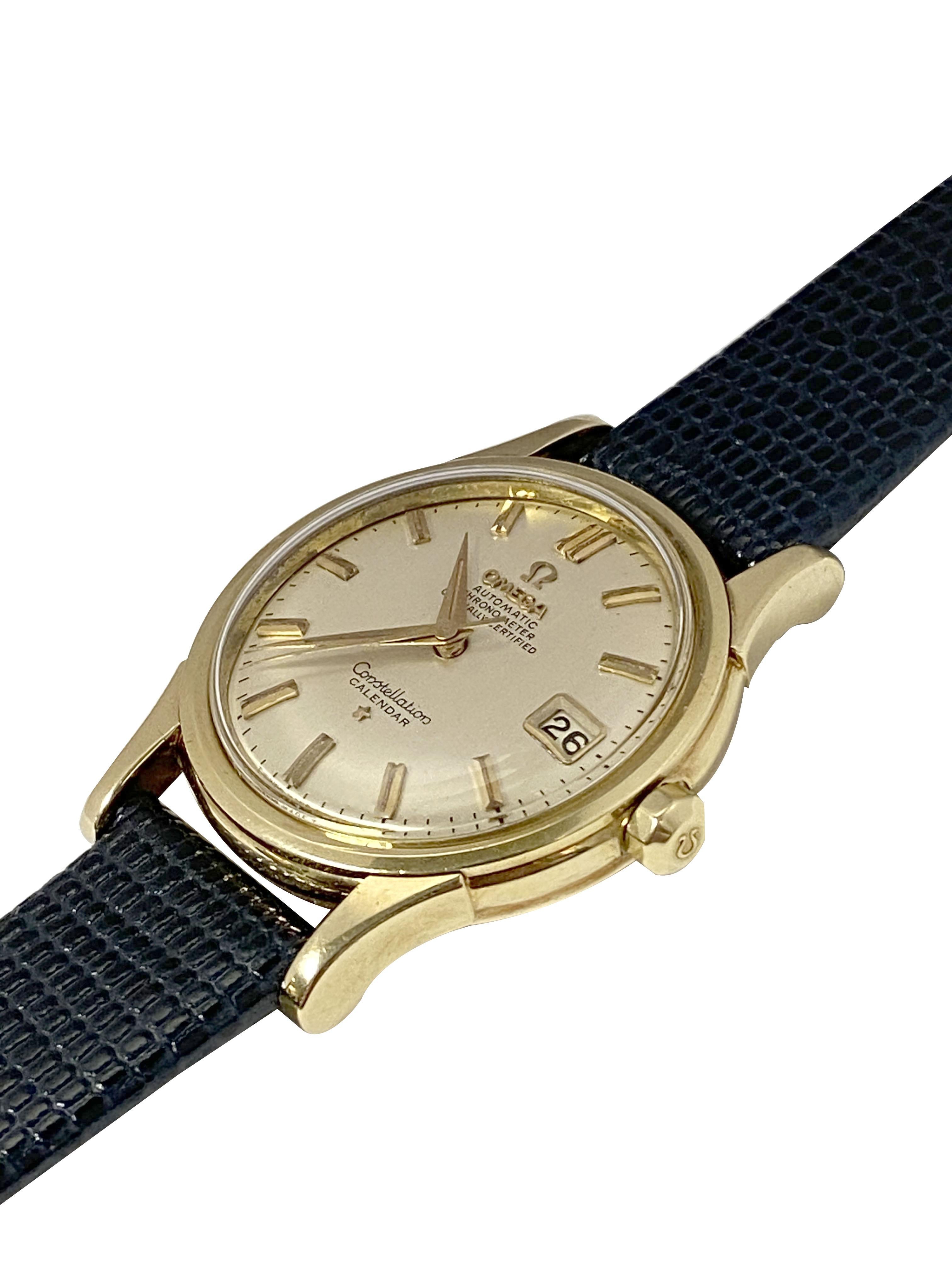 Circa late 1960s Omega Constellation Wrist Watch, 34 M.M. 14K Yellow Gold 2 piece case with Observatory inset on the case back, Automatic, self winding Caliber 504 24 jewel Gilt lever movement. Original Silver Satin dial with Raised Gold markers,