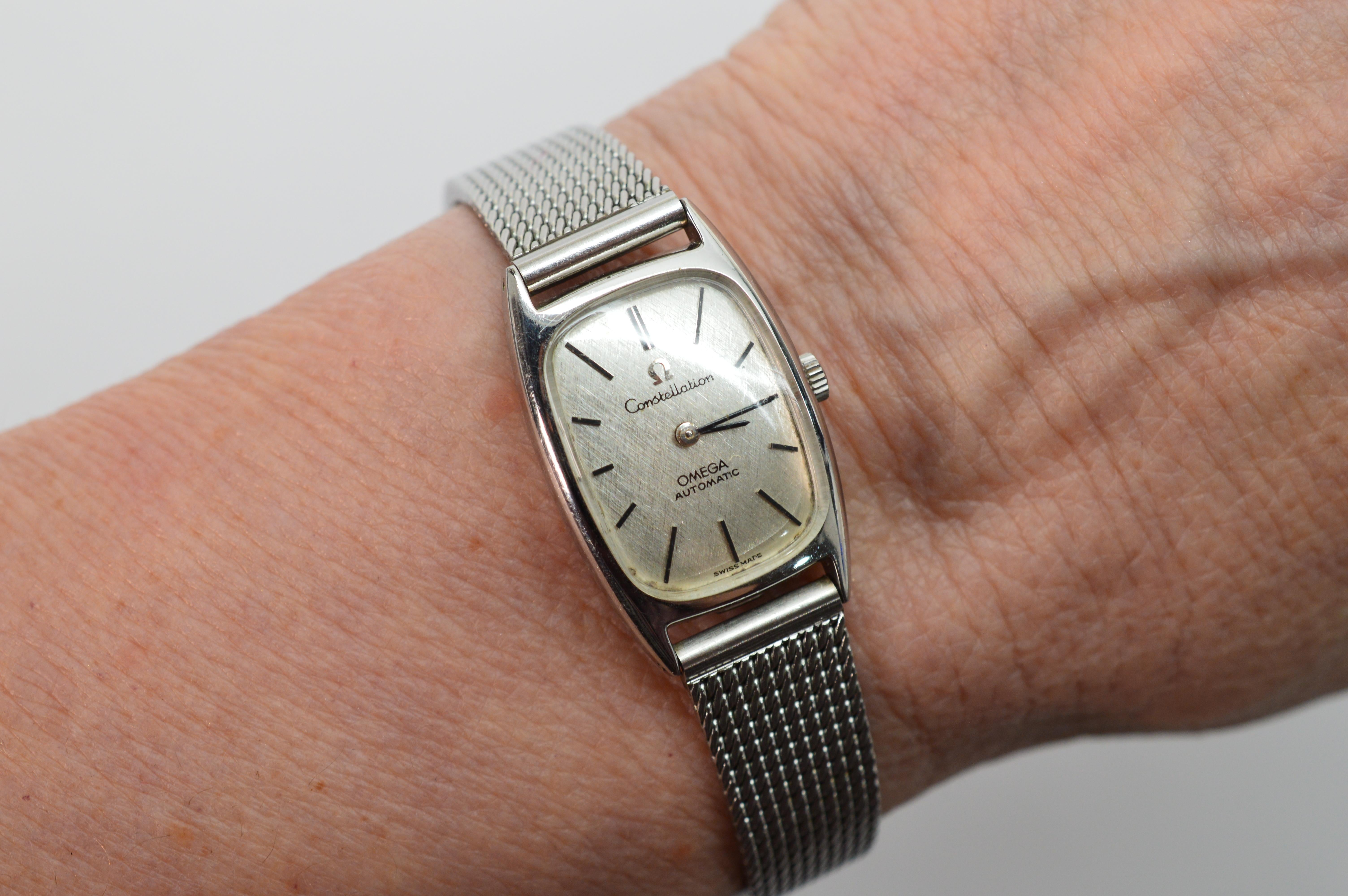 A vintage favorite, transcending casual to dress. Circa 1973, this hard to find Omega Ladies Constellation Wrist Watch has timeless style and functionality. Watch model number 551.09, with an ultra thin stainless steel case. Style number 551.09 and