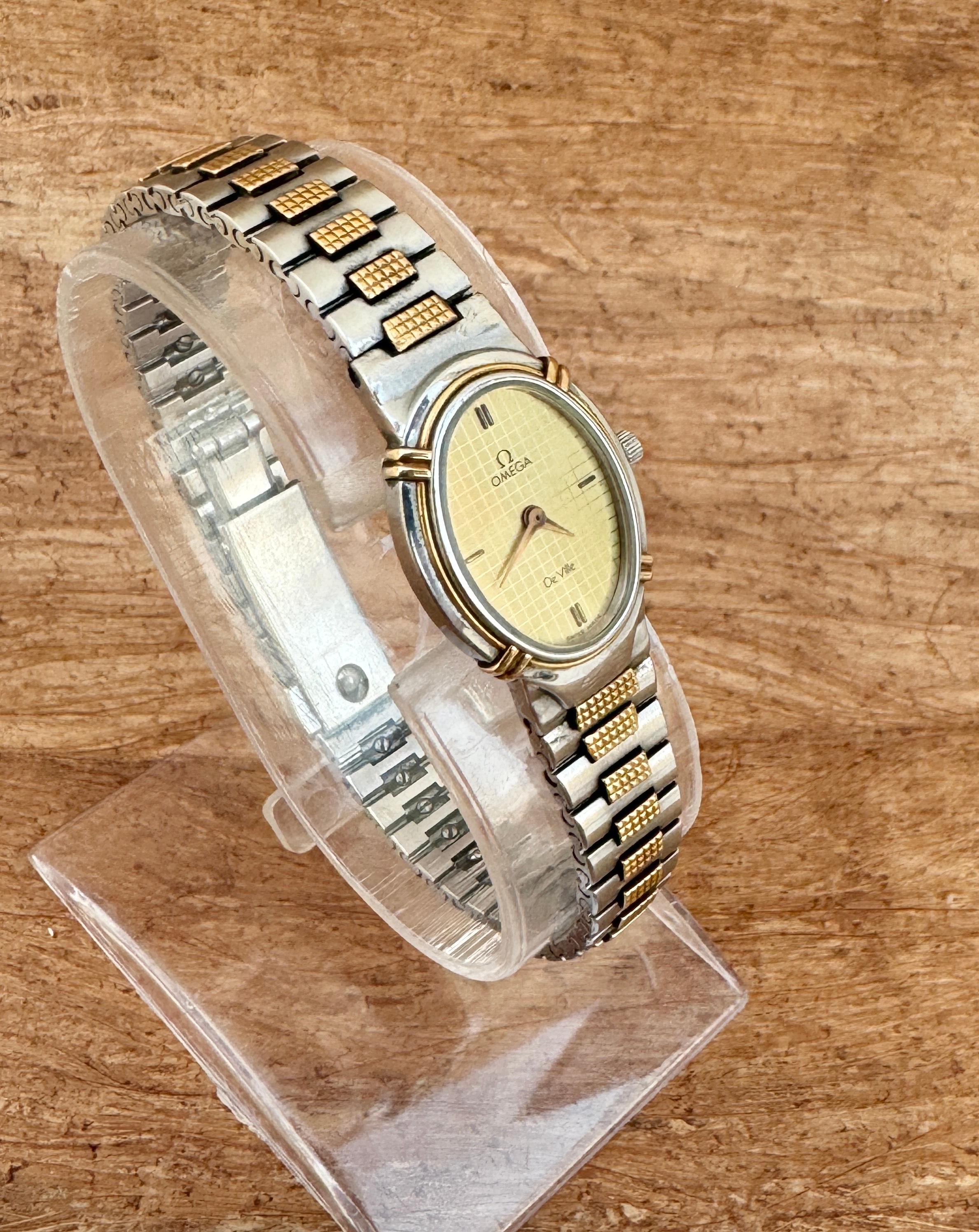 Omega De Ville 1450 Montre à cadran Quadri champagne doré en acier et or pour femmes en vente 7