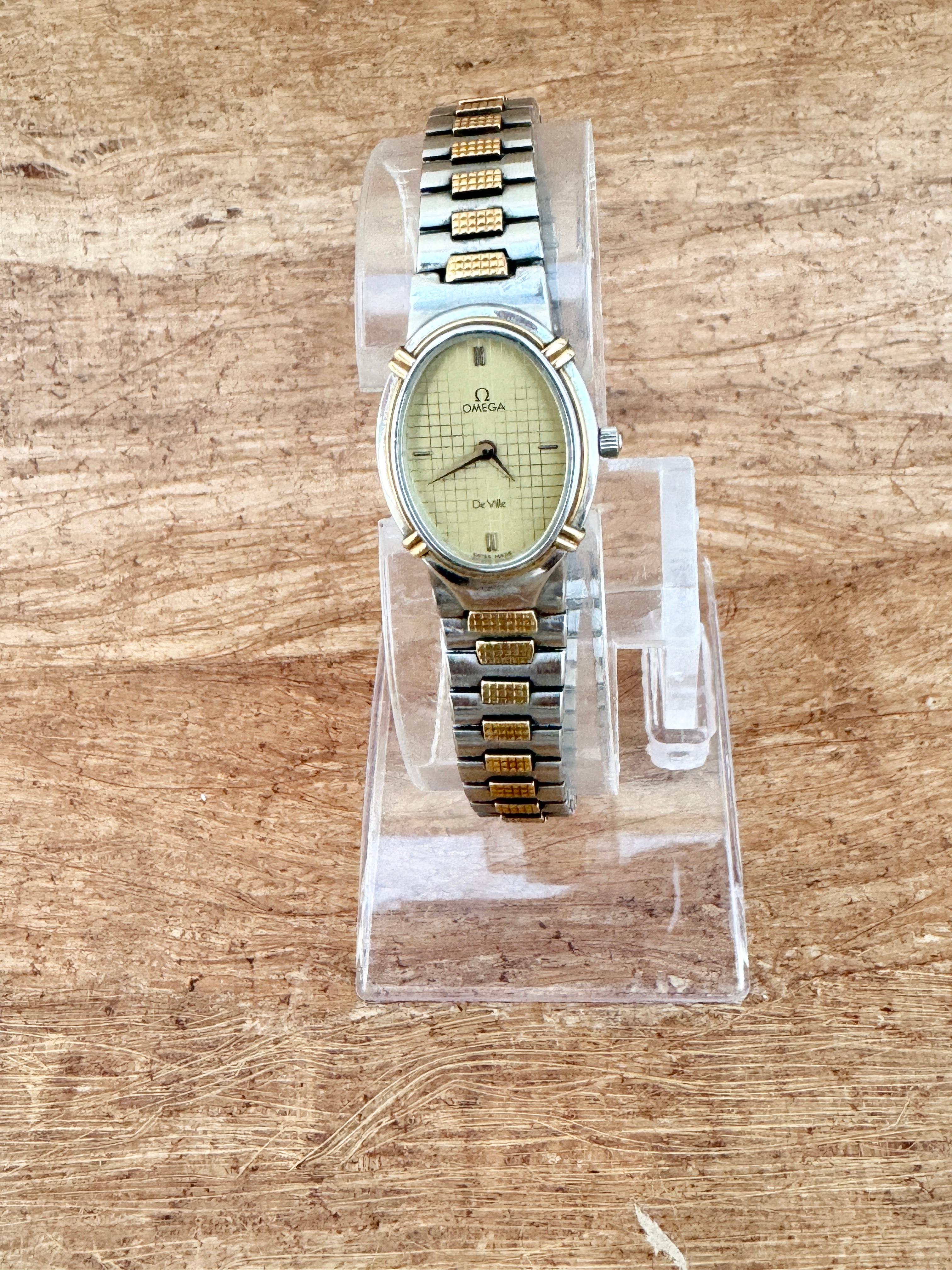 Omega De Ville 1450 Montre à cadran Quadri champagne doré en acier et or pour femmes en vente 9