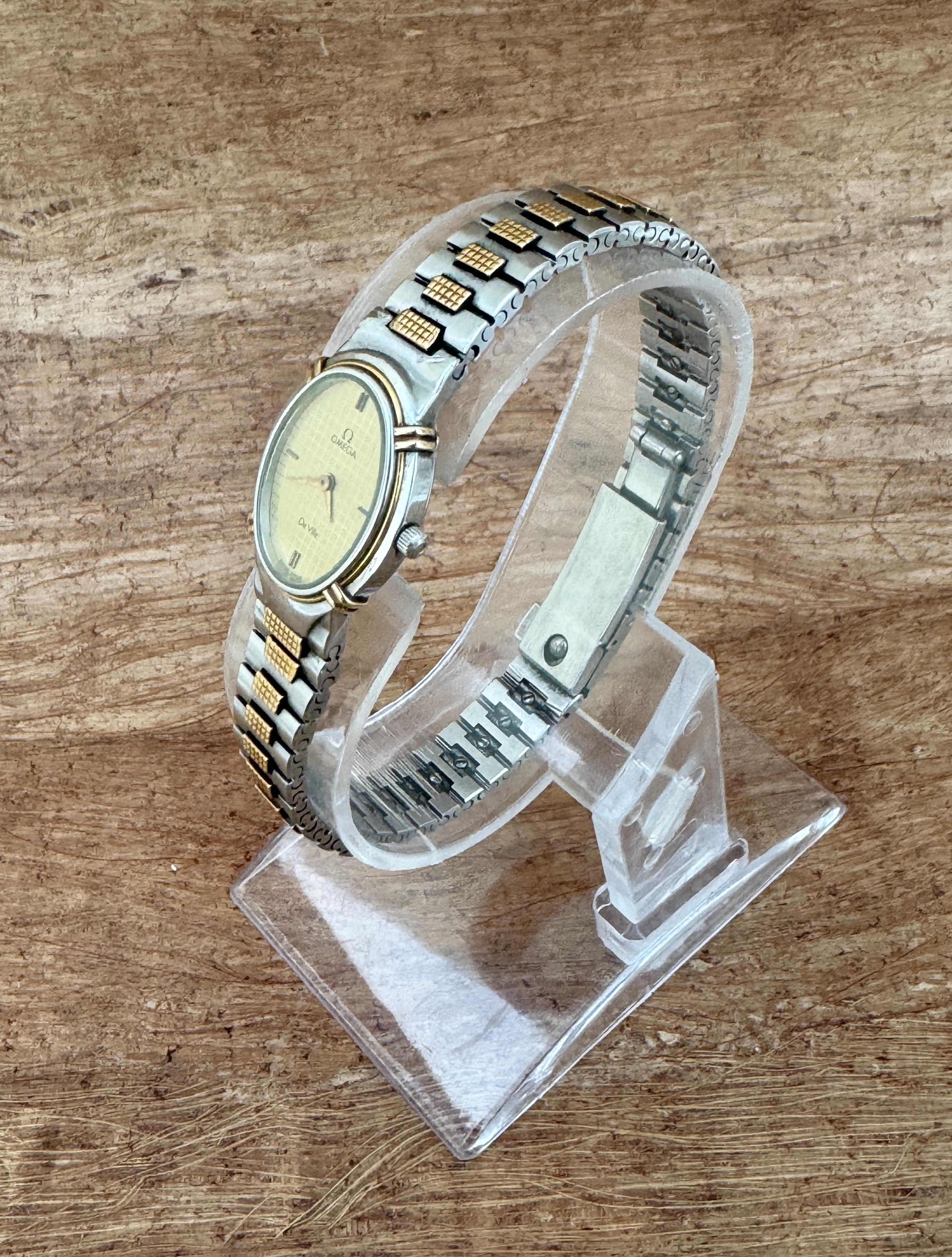 Omega De Ville 1450 Montre à cadran Quadri champagne doré en acier et or pour femmes en vente 10