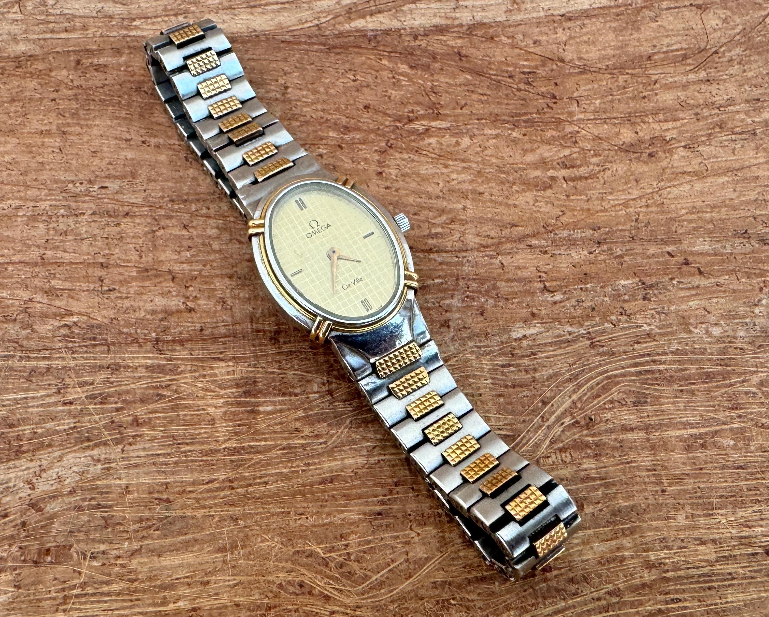 Omega De Ville 1450 Montre à cadran Quadri champagne doré en acier et or pour femmes Pour femmes en vente