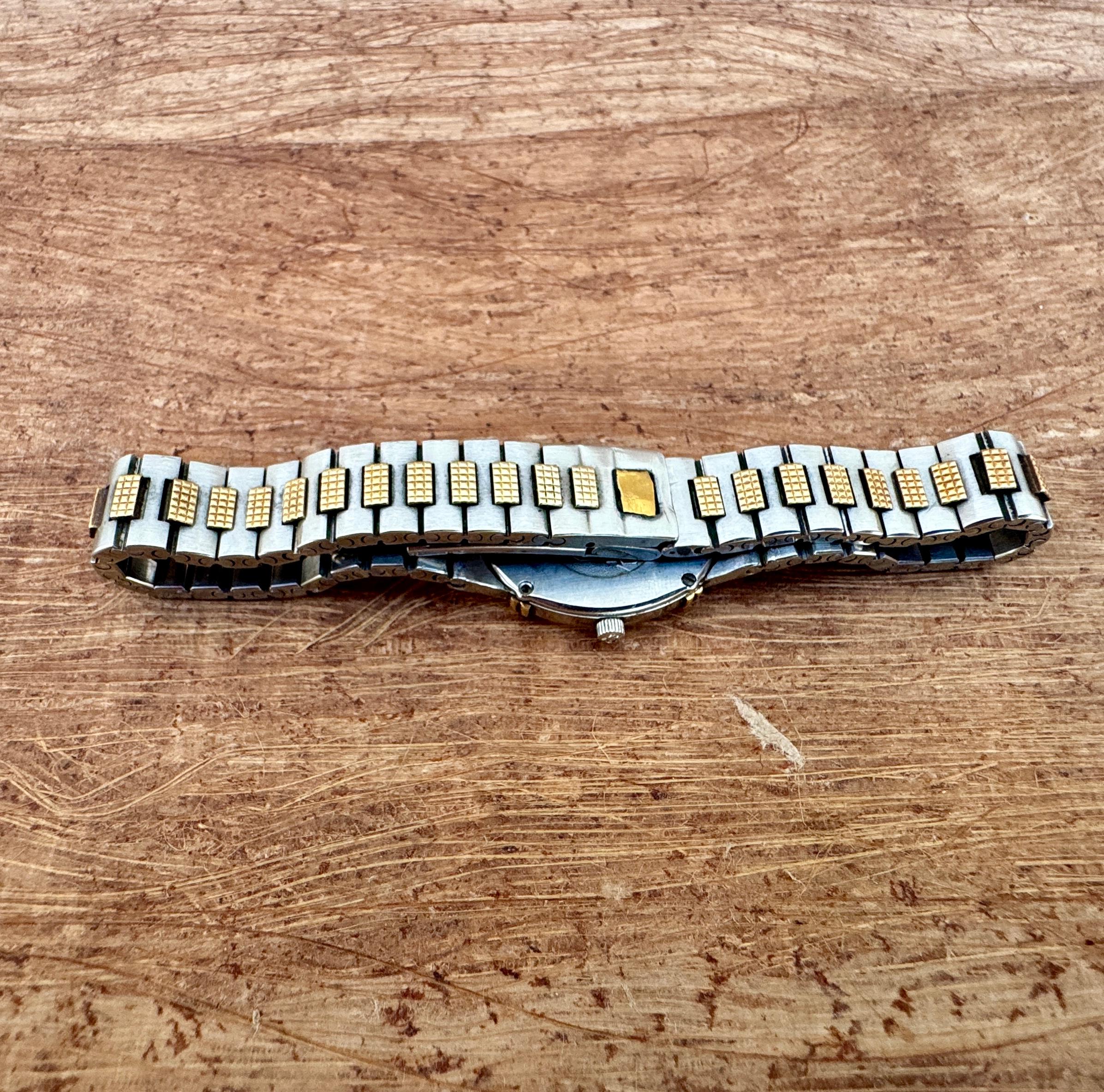 Omega De Ville 1450 Montre à cadran Quadri champagne doré en acier et or pour femmes en vente 3